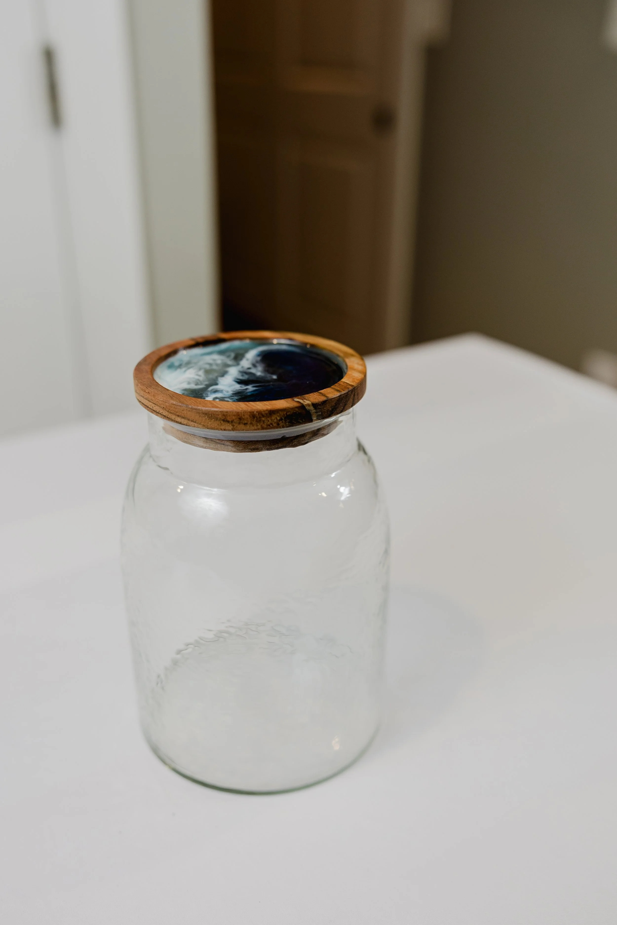 Artisan Glass Storage Jar with Resin and Wood Lid
