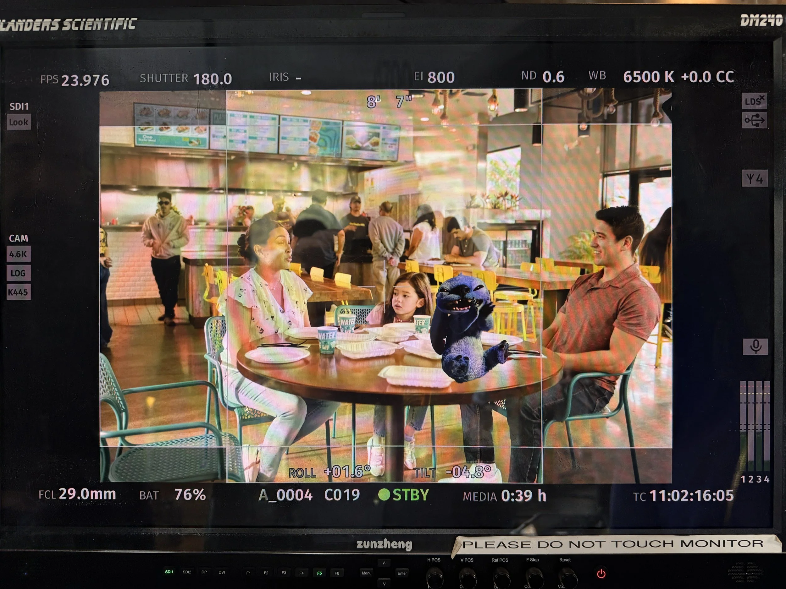 A view of the monitor in video village with the cardboard Stitch stand-in for reference.