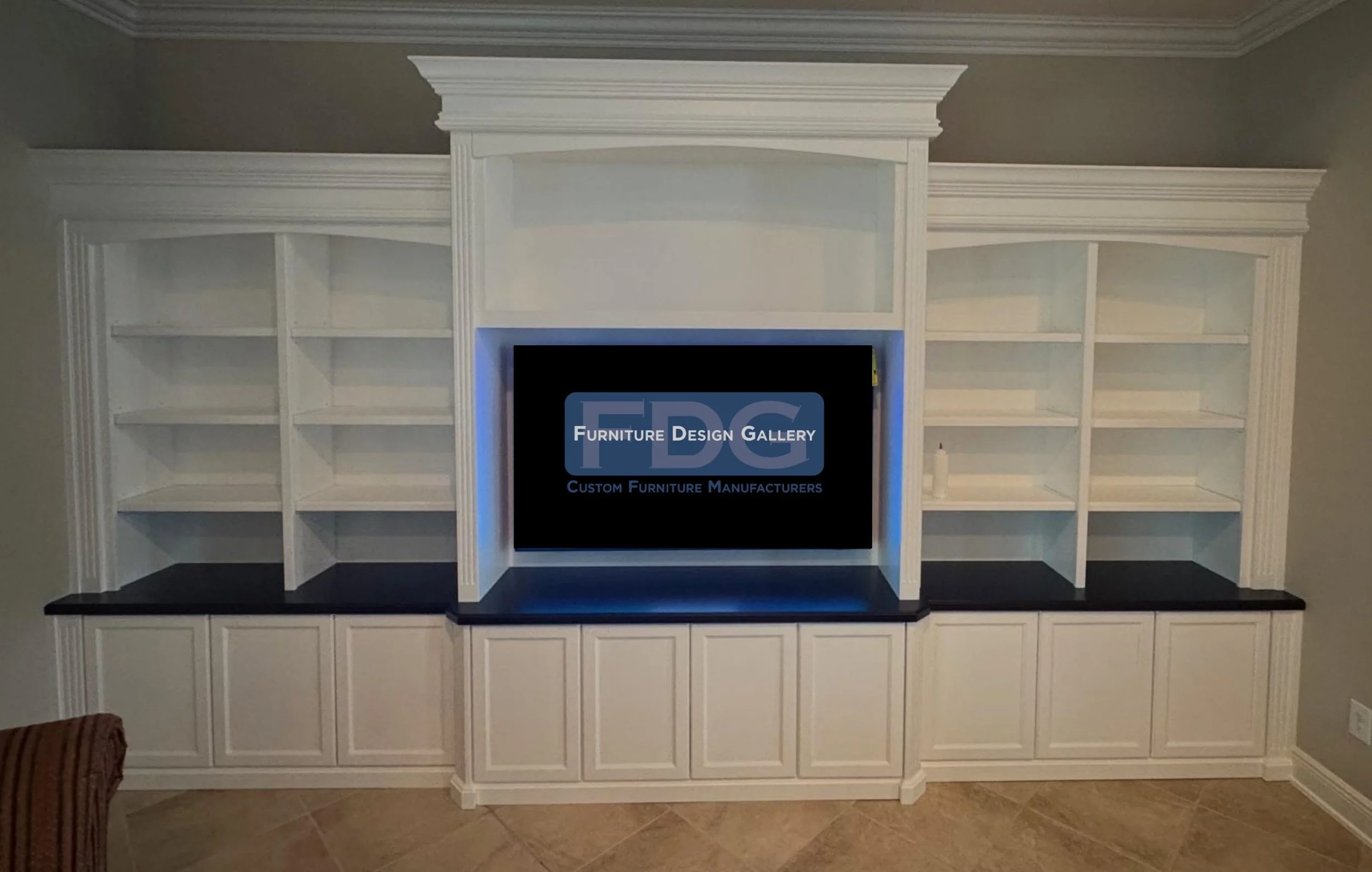 44. Classic, clean, and commanding. This custom white wall unit features elegant crown molding, soft arched shelving, and a contrasting dark countertop, accented by modern LED backlighting for a touch of contemporary flair.