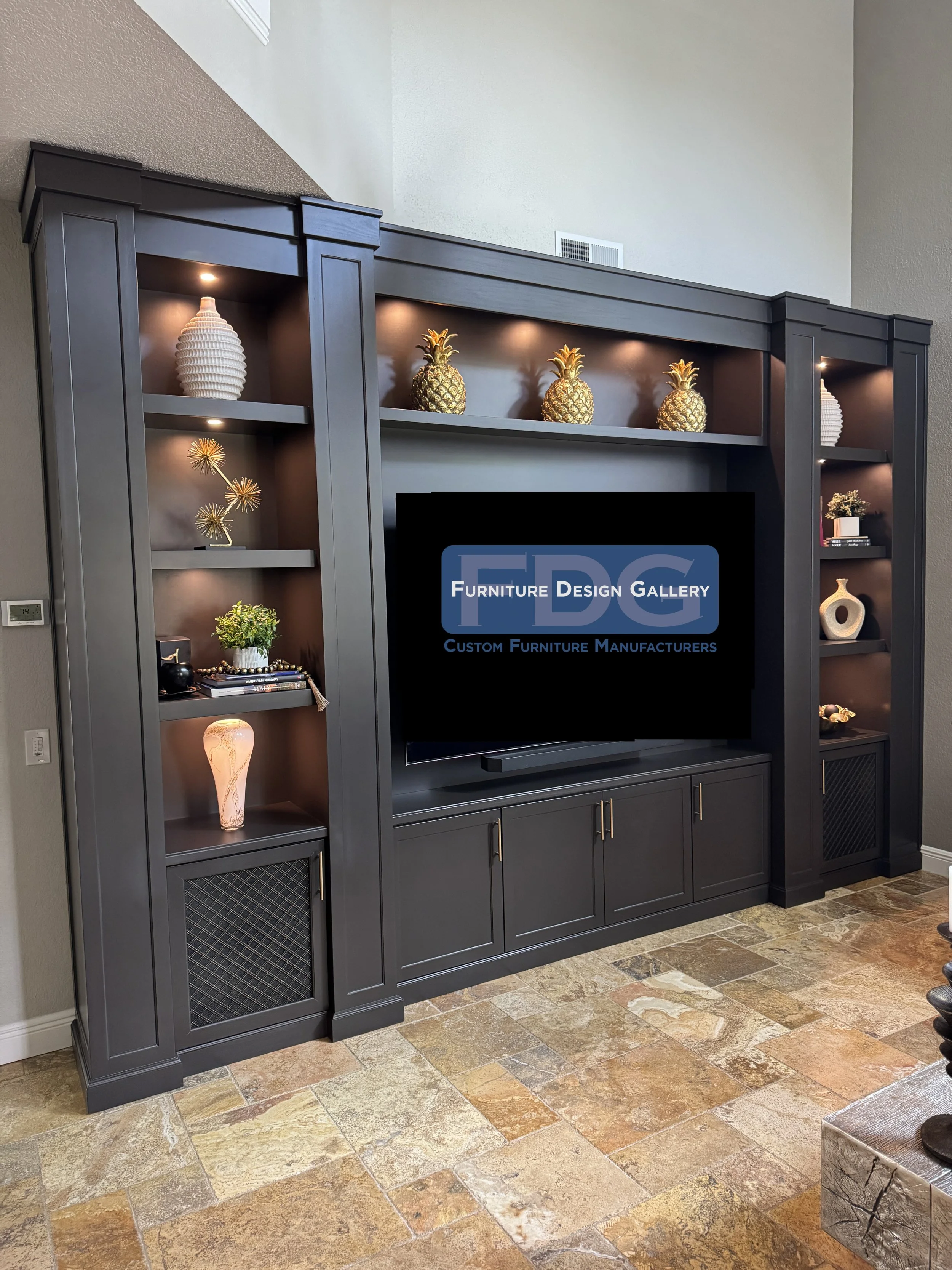 78. Custom Living Room Media Wall | Integrated LED display lighting, custom dark stained finish, and woven mesh cabinet doors designed to elevate your main gathering space.