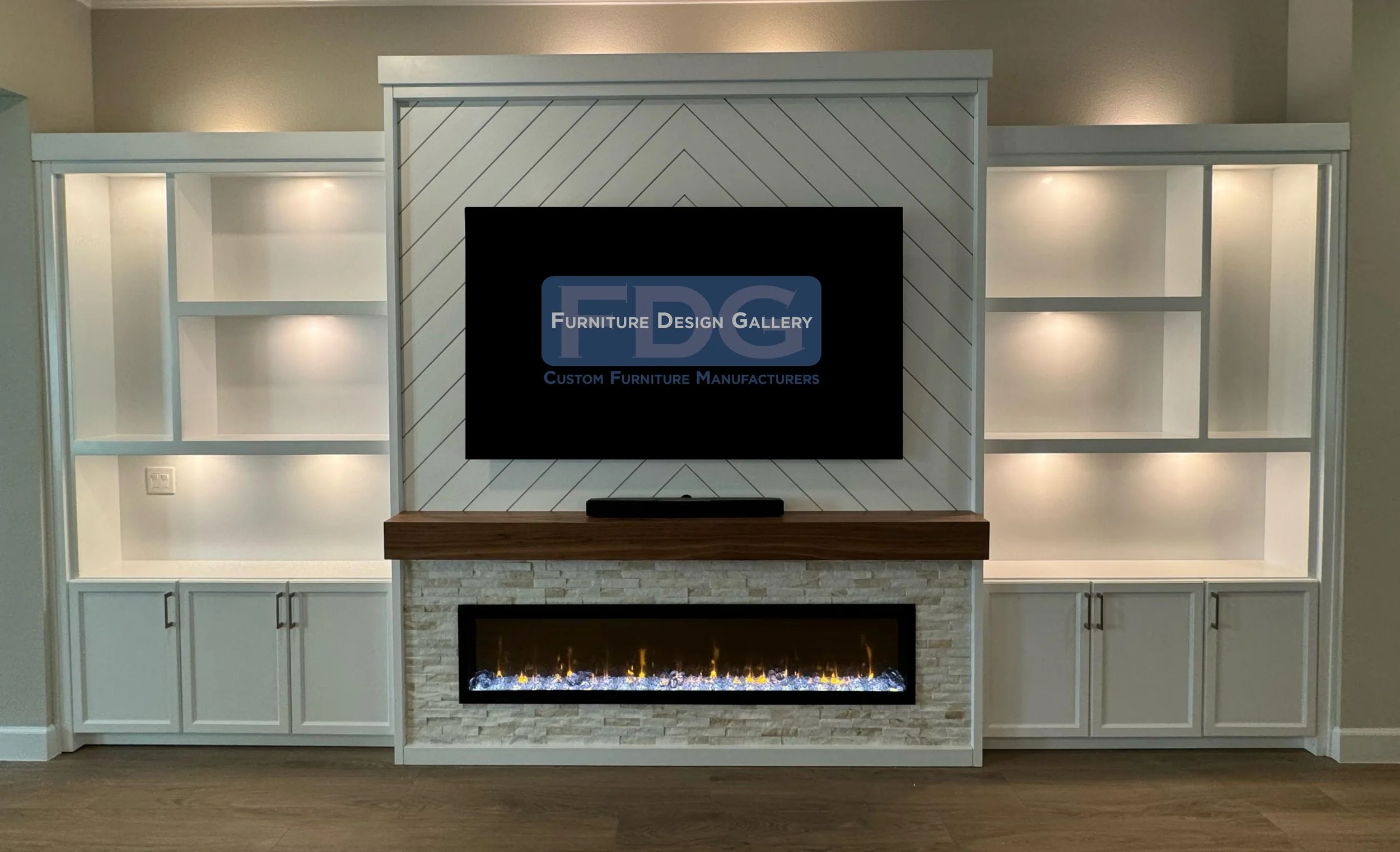 40. A stunning mix of textures and tones. This custom white wall unit features a chevron-patterned backdrop, a warm wood mantel, and a stacked-stone fireplace surround for a contemporary, high-contrast look.