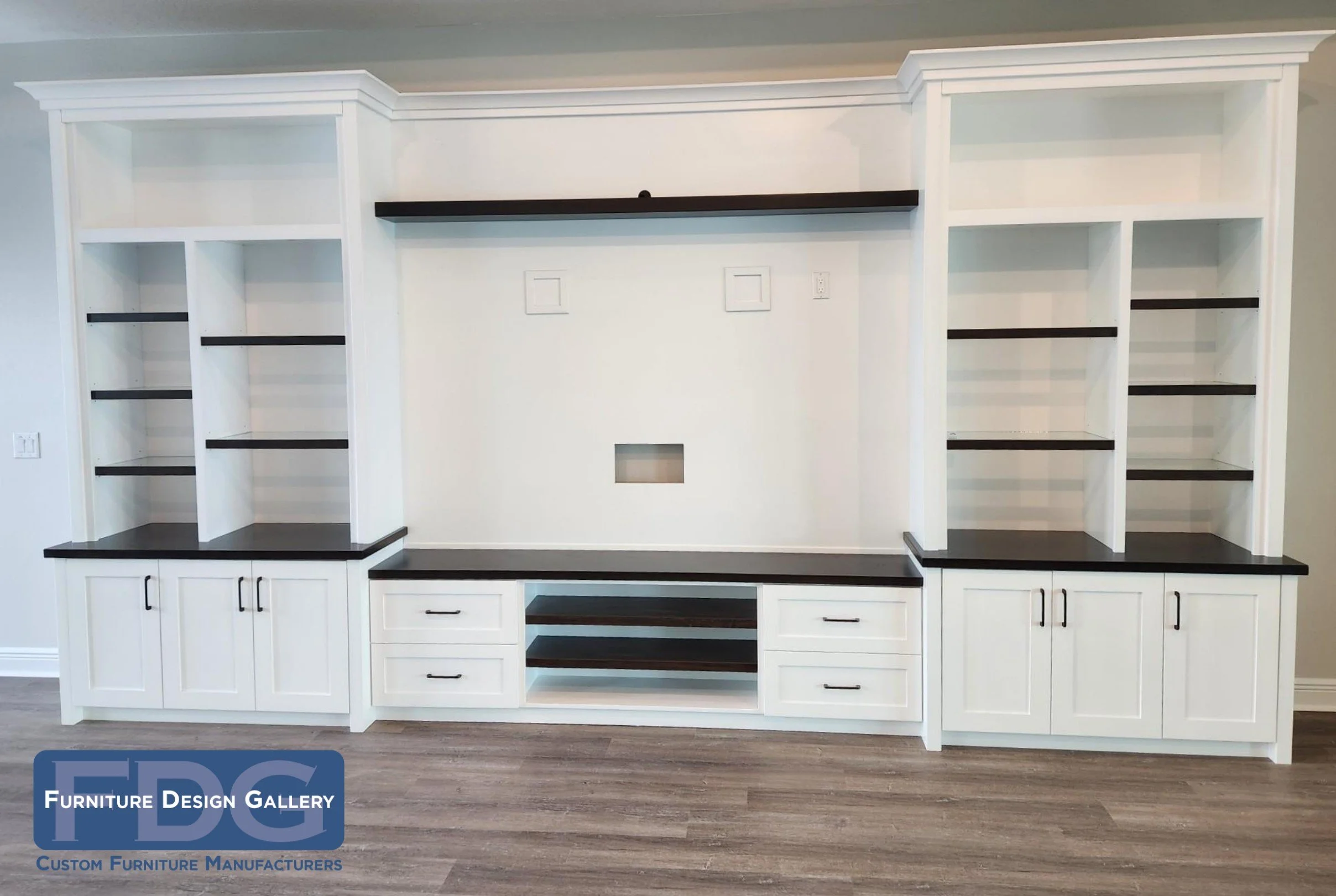 18. Sleek, modern, and massive. 📐 This custom wall unit features bold dark-wood accents and integrated wire management for a clean, professional finish.