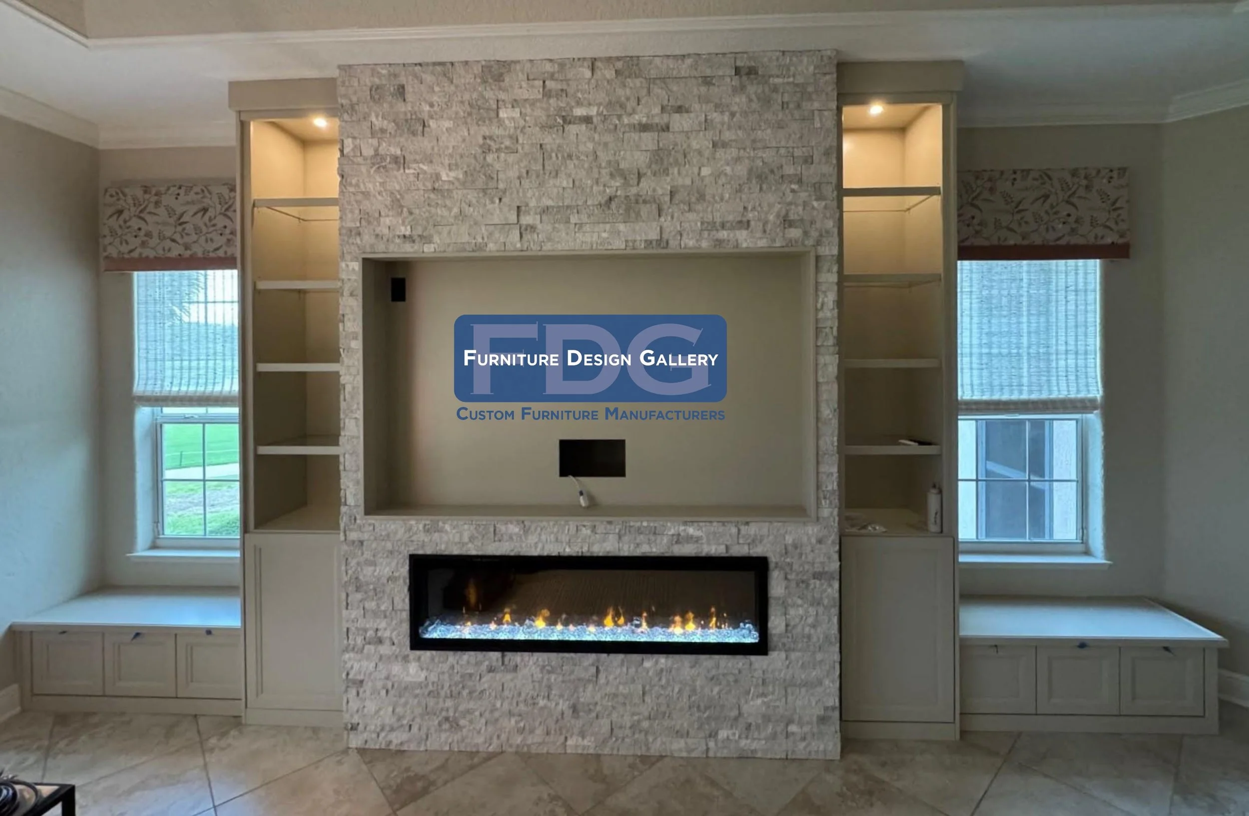 74.  Transform your living room with a custom entertainment center that makes a grand statement. This floor-to-ceiling design features a dramatic stacked stone media wall, an integrated linear fireplace, illuminated display shelving, and matching bui
