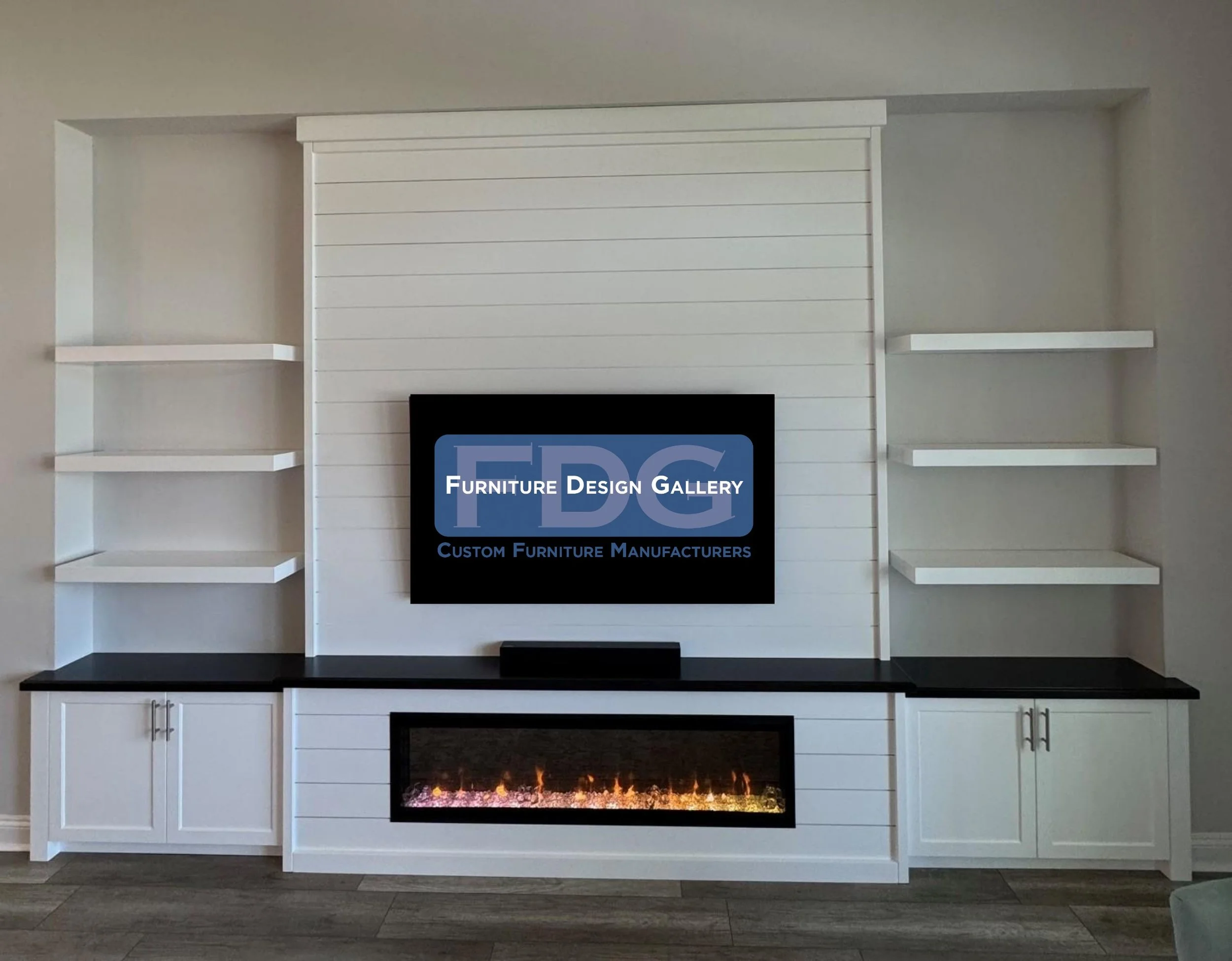 67.  Bring a crisp, welcoming look to your living space with this custom shiplap entertainment center. The striking contrast between the dark countertops and bright white cabinetry beautifully frames the built-in linear fireplace and floating shelves