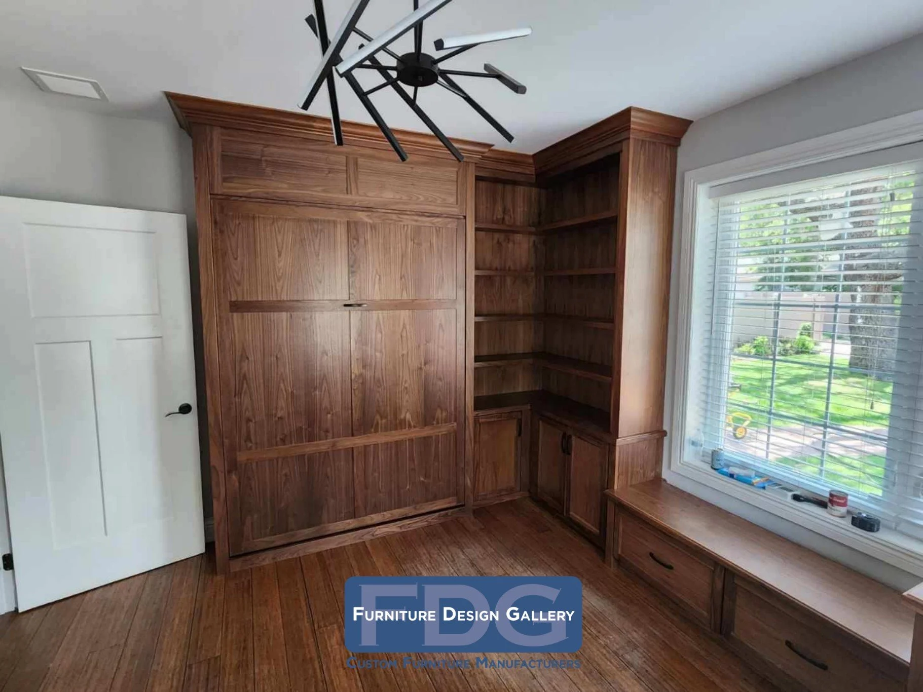 5. Warm walnut tones elevate this multifunctional space, featuring a seamless custom Murphy bed, integrated corner shelving, and a matching window bench for extra storage.
