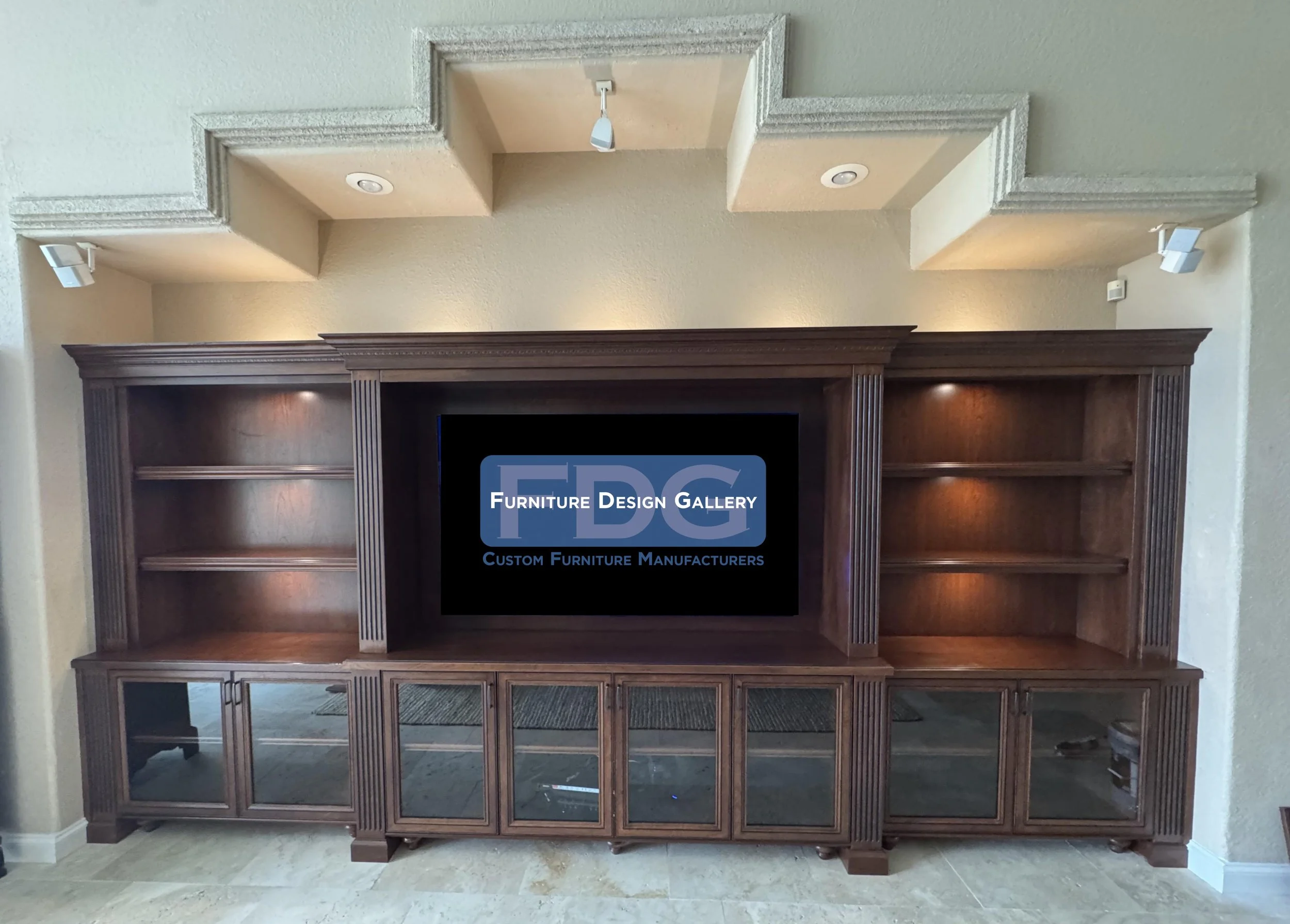 62. This custom wall unit blends classic wood tones with glass-front cabinetry for the ultimate living room centerpiece.