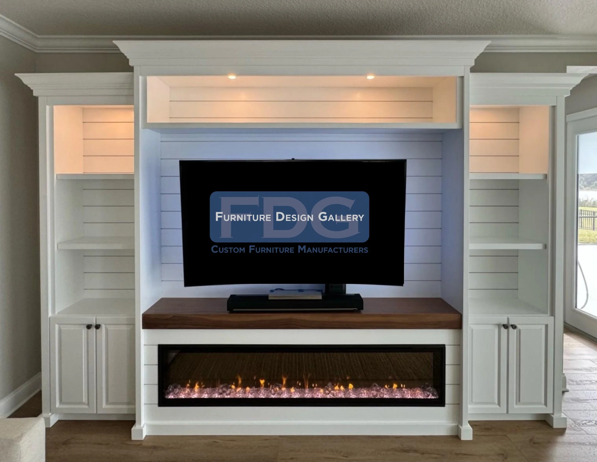 6. A coastal-inspired classic. This custom wall unit features crisp white shiplap detailing and a rich wood mantel, anchored by a sleek linear fireplace for a bright, airy, and inviting focal point.