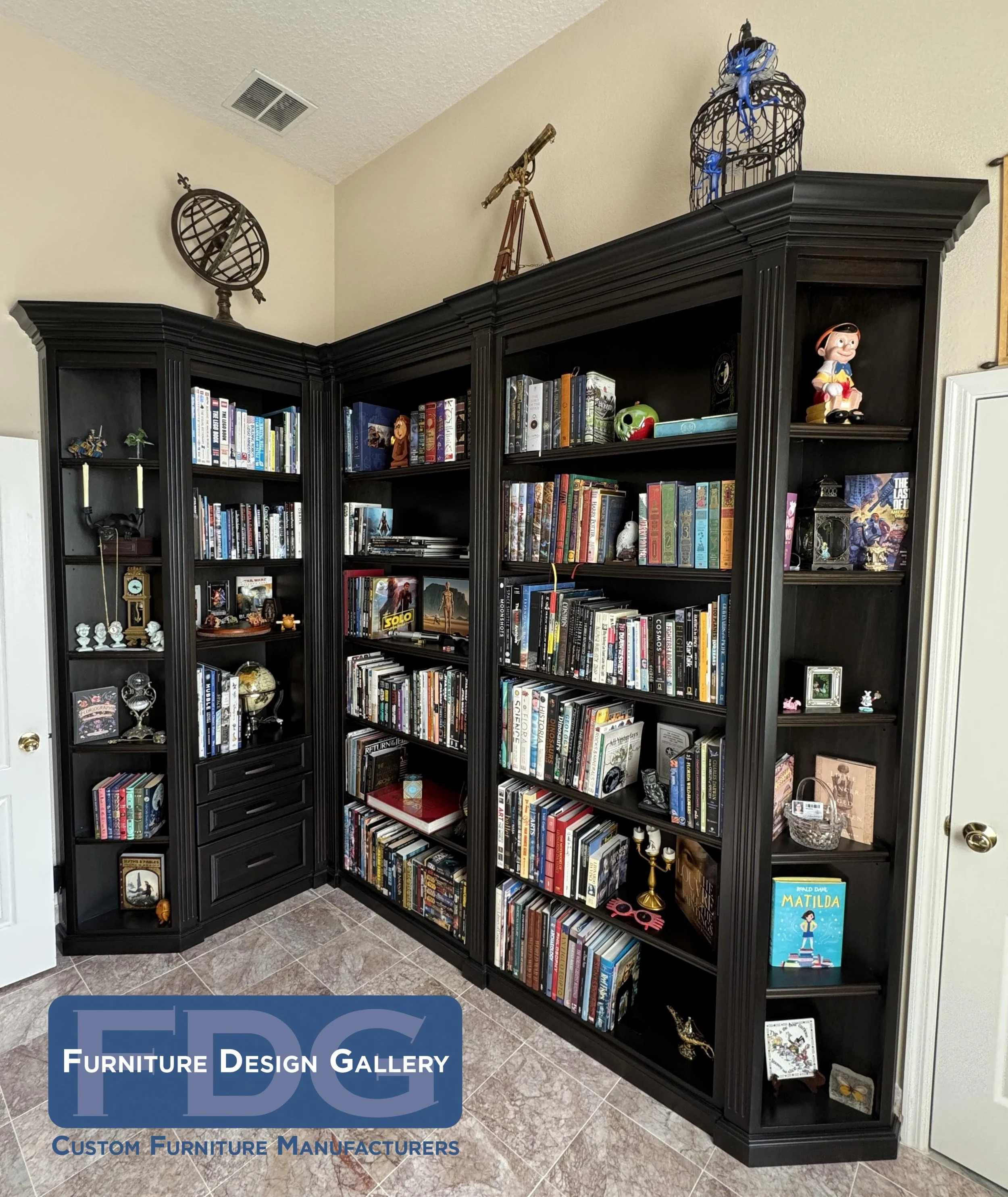 3. A bibliophile’s dream. This custom wrap-around library features a rich espresso finish and classic crown molding, providing the perfect stage for a curated collection of treasures and tales.