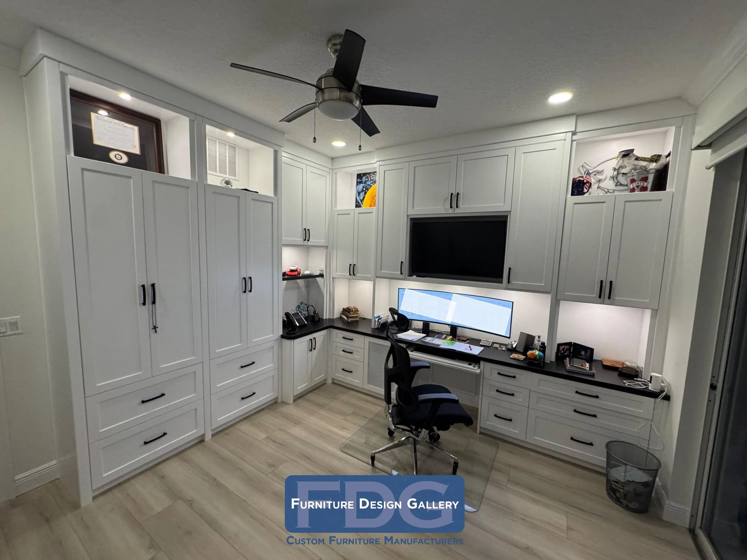7. The ultimate dual-purpose space: a seamless custom Murphy bed paired with a functional built-in desk, all finished in a crisp white for a clean and versatile guest-office.