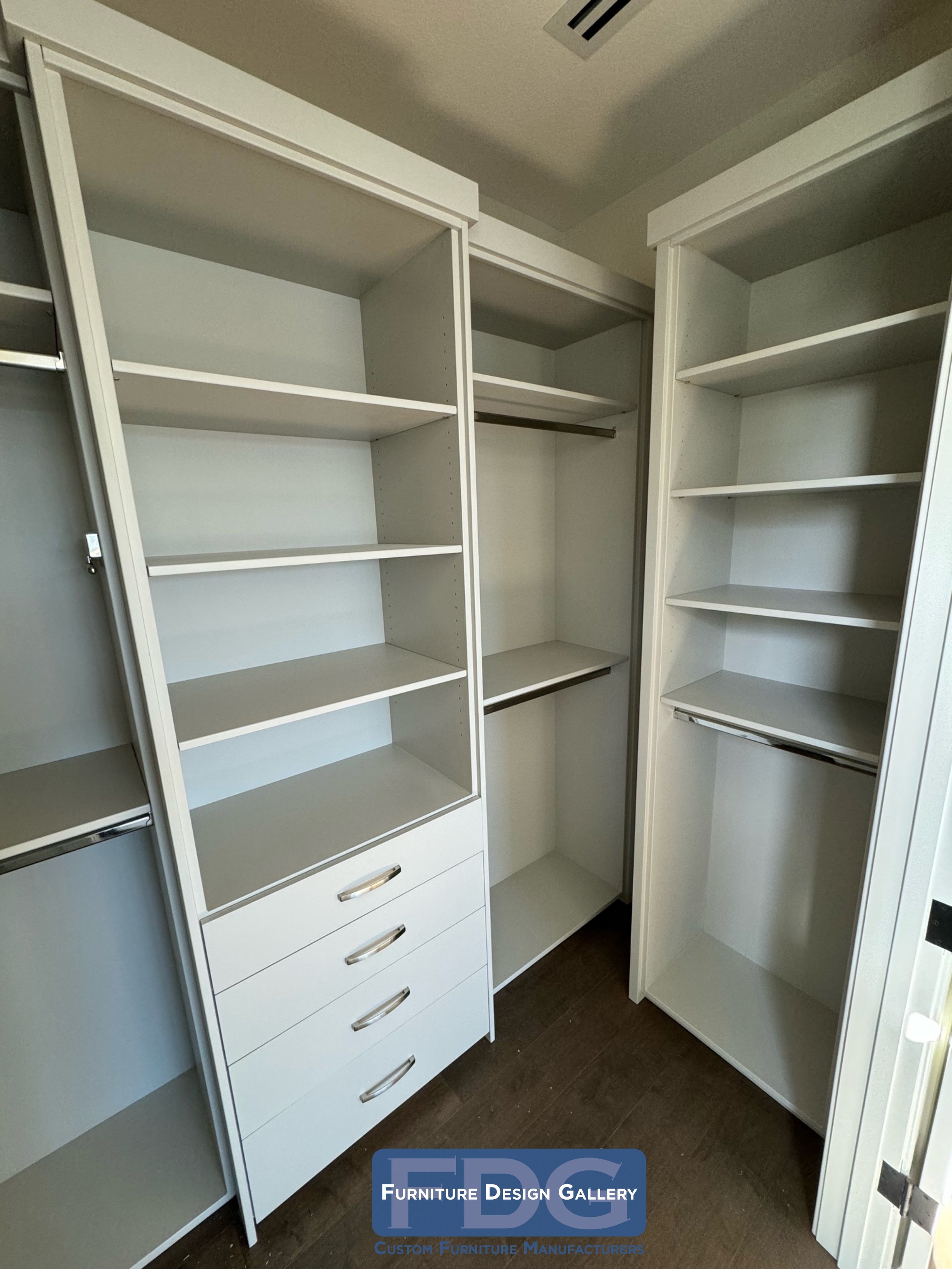 11. Maximize your space with custom-built elegance: a perfect blend of adjustable shelving and sleek drawer storage.
