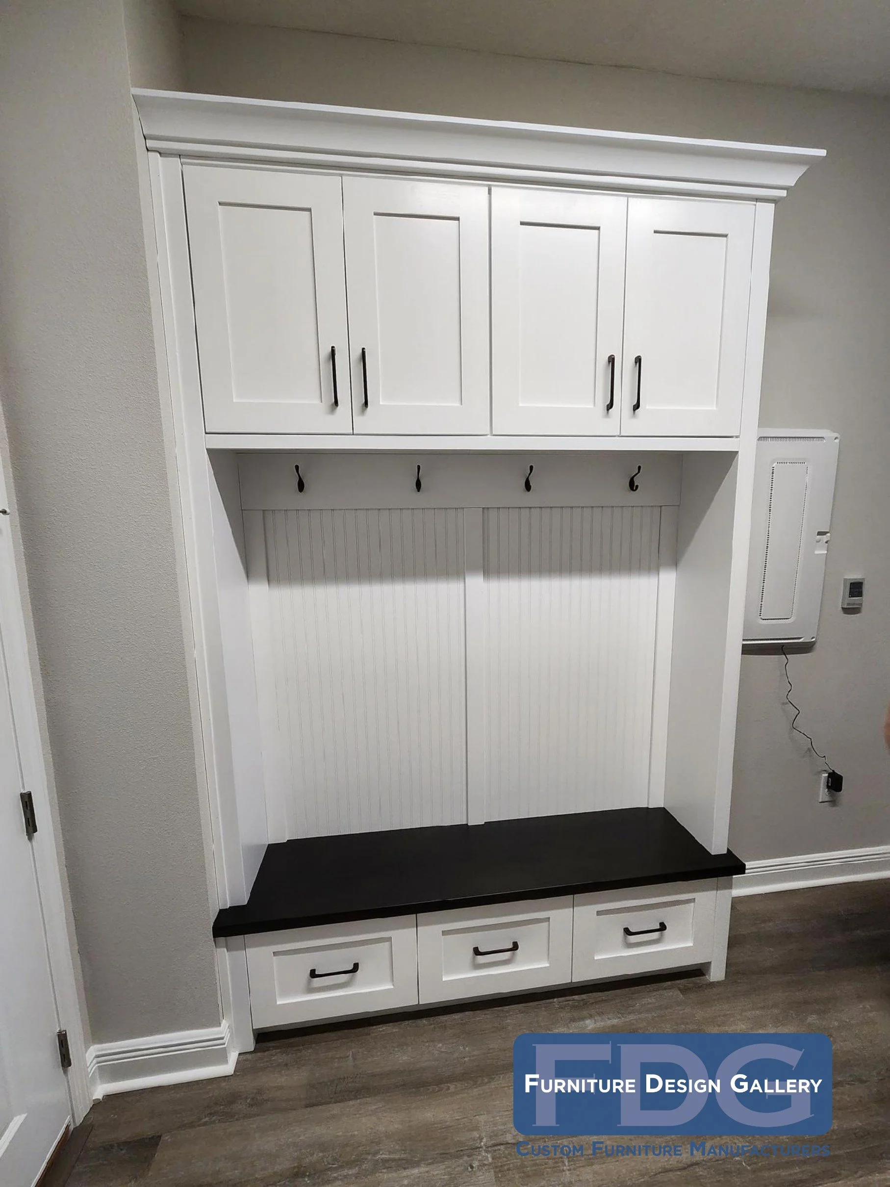 5. Streamline your entryway with the Classic Overhead Suite. 🧥✨ This custom mudroom unit features a seamless build, integrating deep overhead storage cabinets and lower pull-out drawers for a clutter-free home.