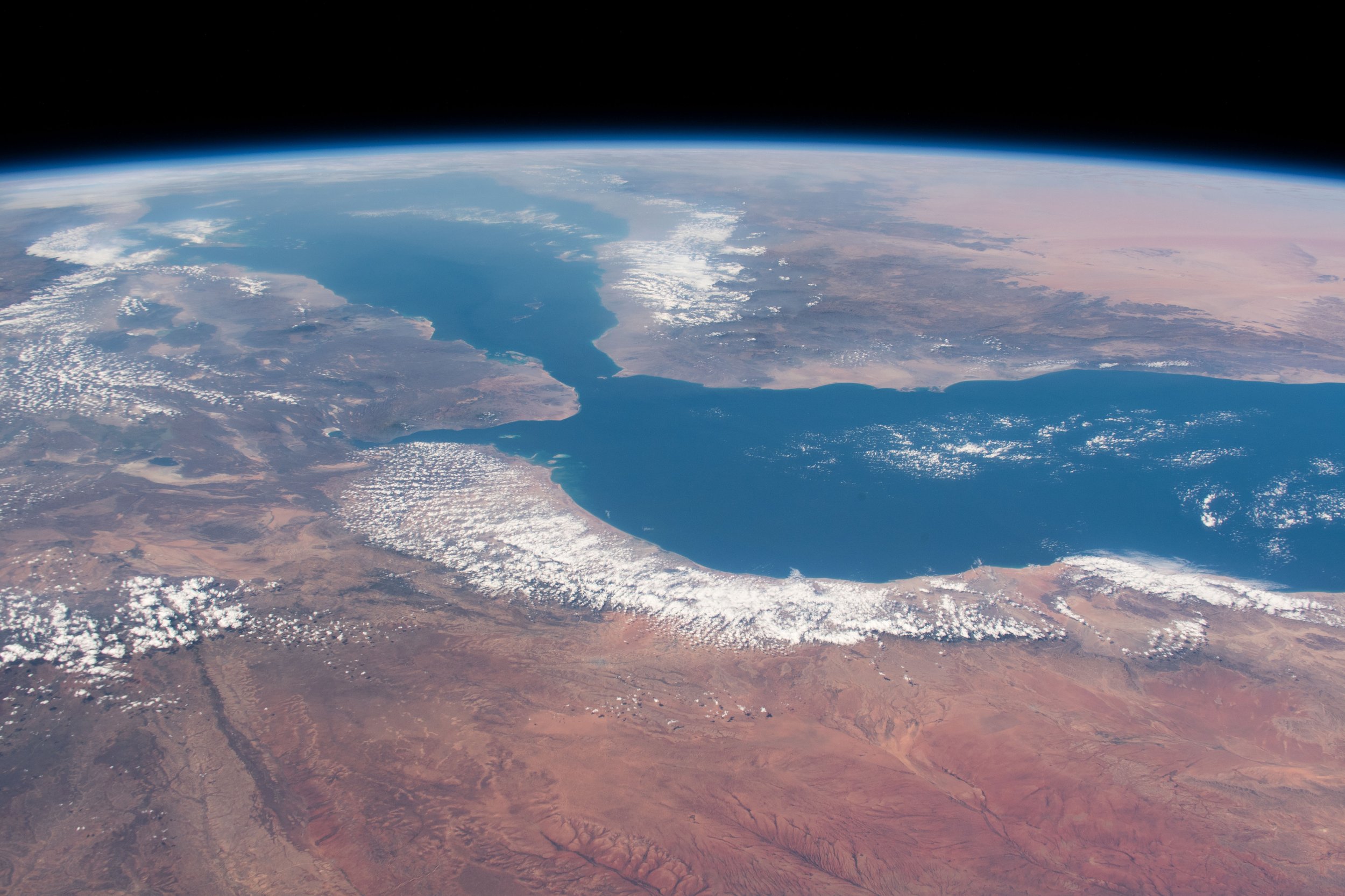 View from orbit of the Strait of Hormuz connecting the Persian Gulf with the Gulf of Oman, with Iran to the north and the Arabian Peninsula to the south.