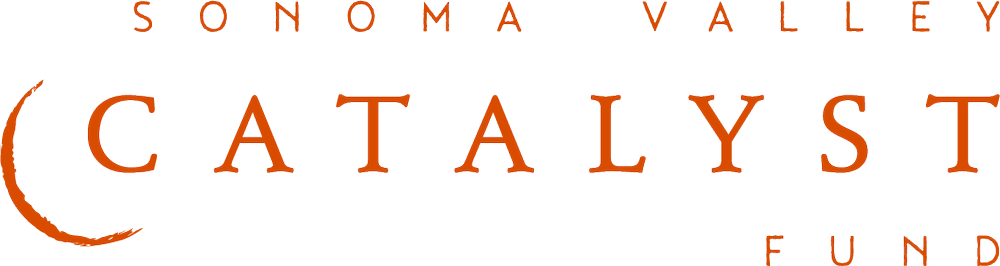 Logo of Sonoma Valley Catalyst Fund with stylized text and design elements in orange and black. Sonoma Catalyst Club Logo