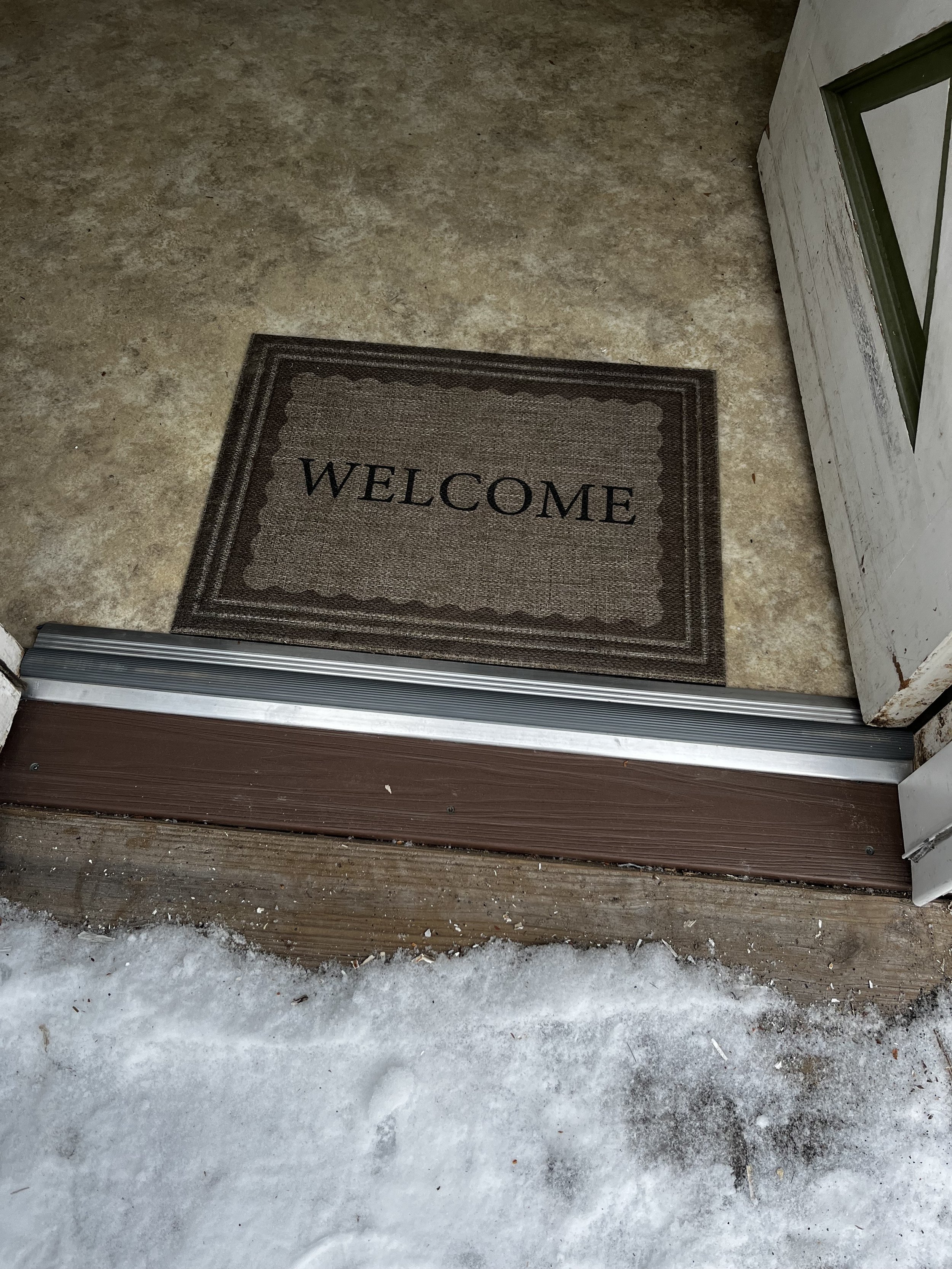 Exterior Door Threshold Replacement in Farwell, Michigan by Lowe Maintenance LLC