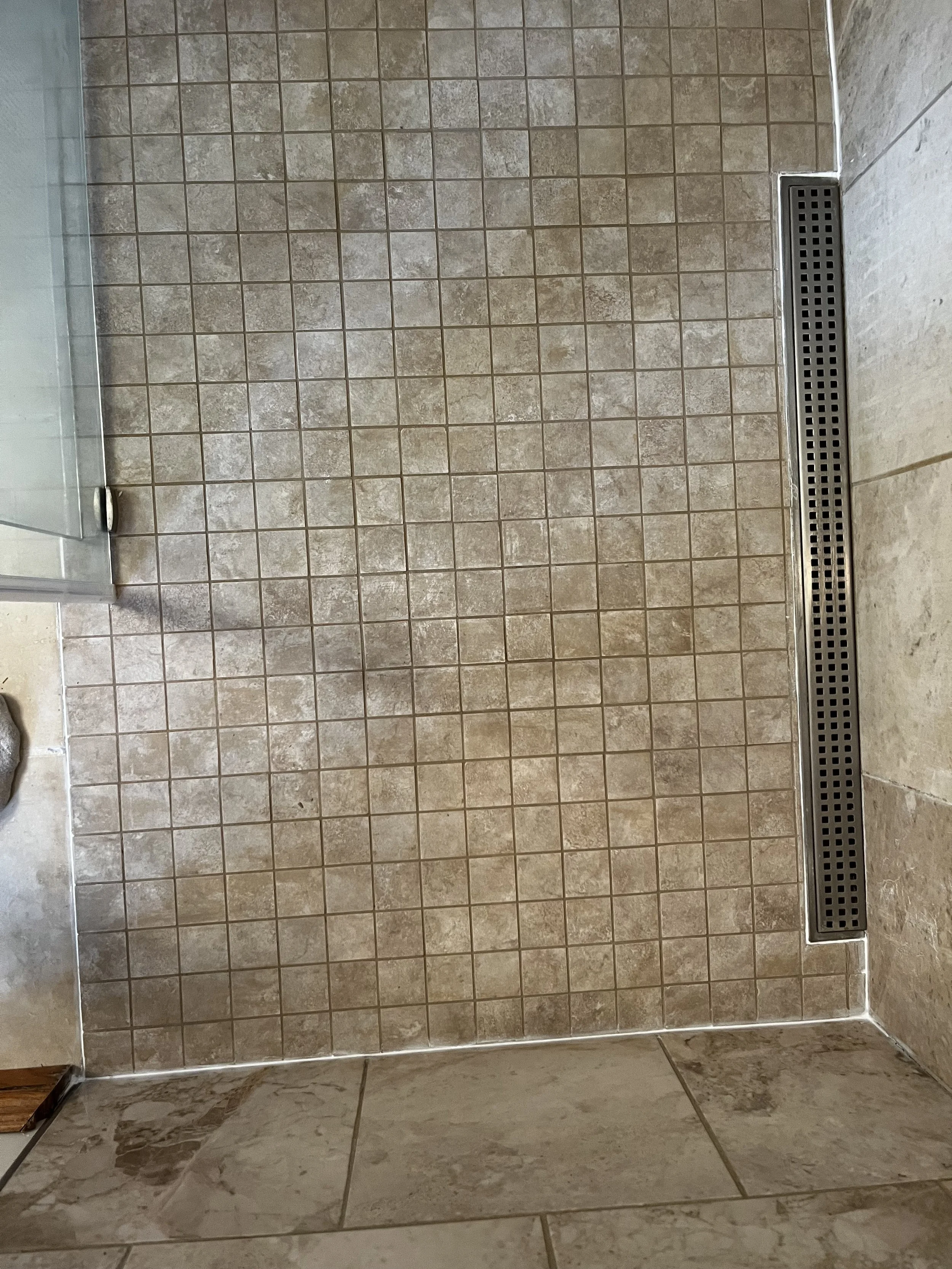 After picture of a shower tile re-grout job in Mount Pleasant, Michigan.