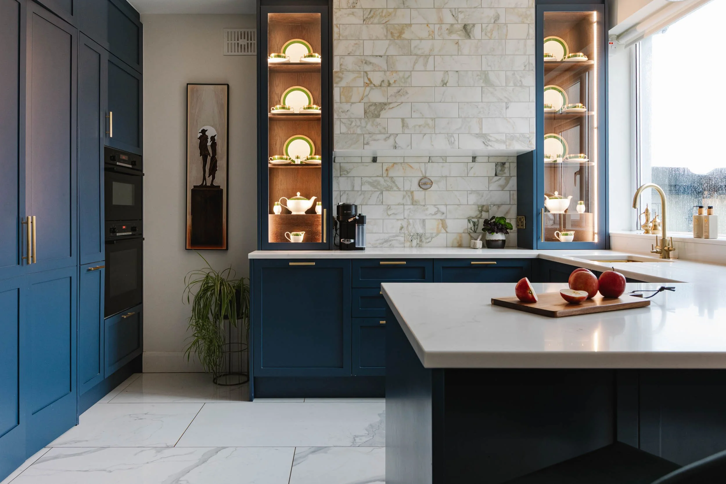 Custom kitchen design, finishes selection, integrated lighting