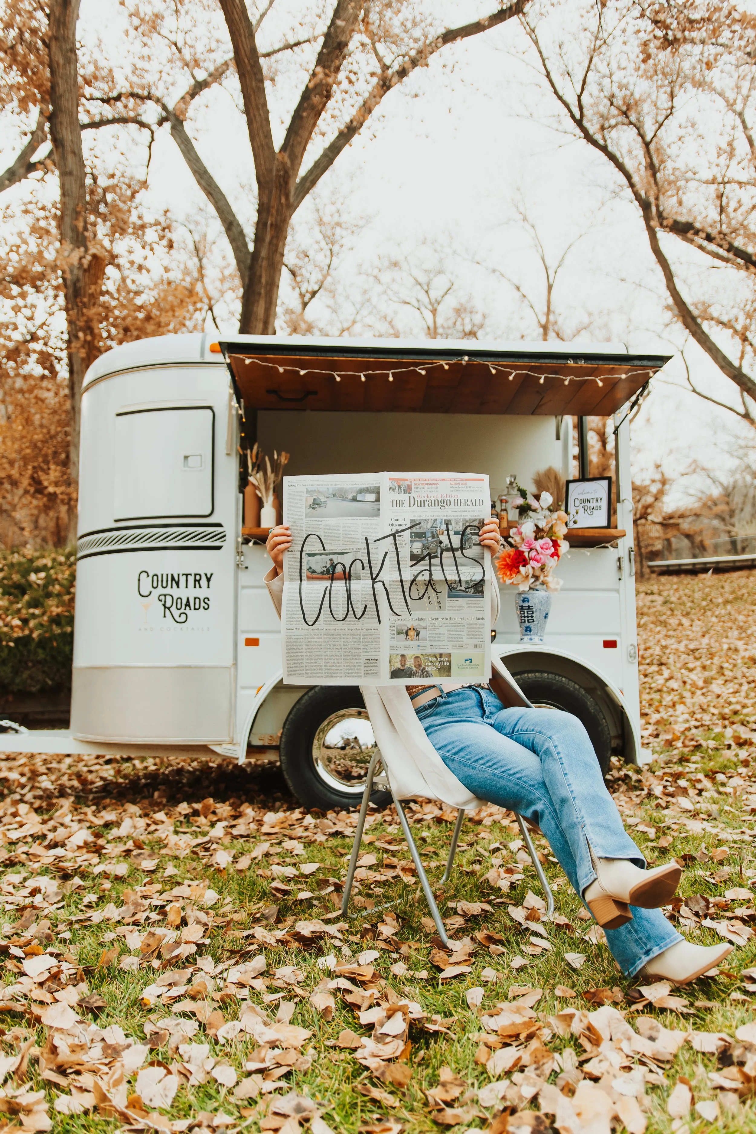 Country Roads and Cocktails newspaper horse trailer