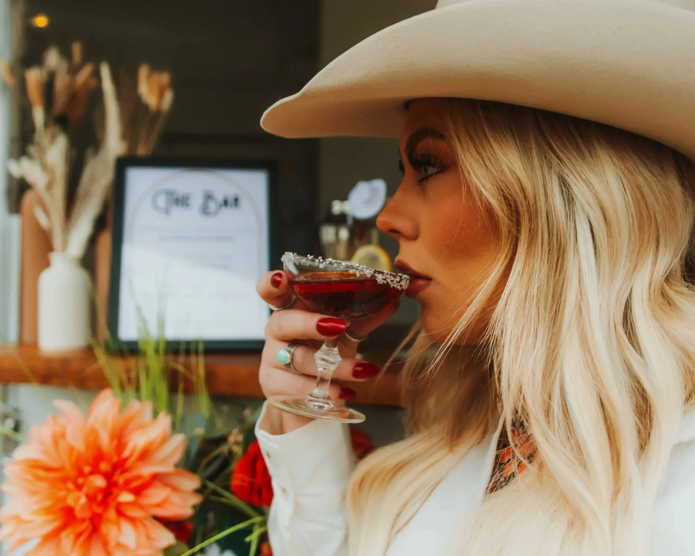 Country Roads and cocktails sipping signature drink