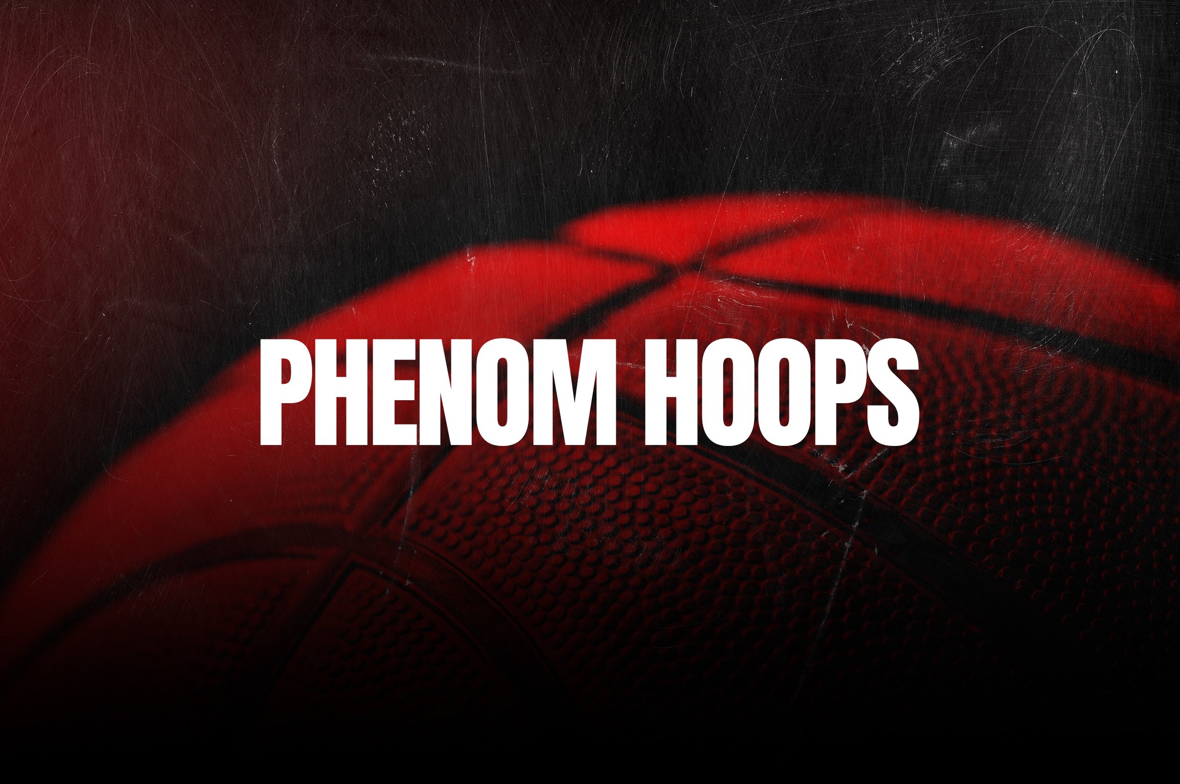Close-up of a basketball with the text 'PHENOM HOOPS' over it.