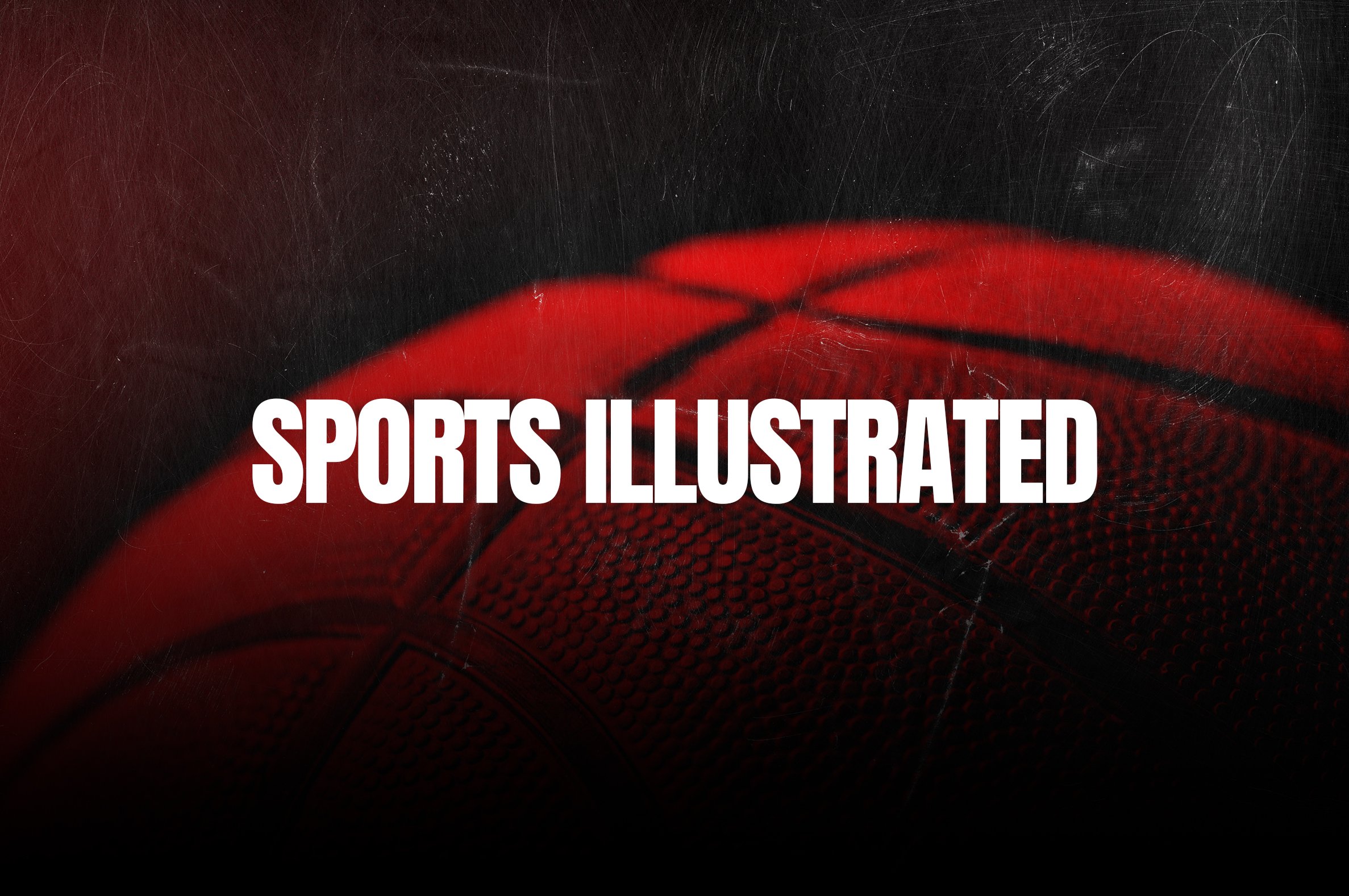 Close-up of a red basketball with black lines and textured surface, overlaid with the white text 'Sports Illustrated'.