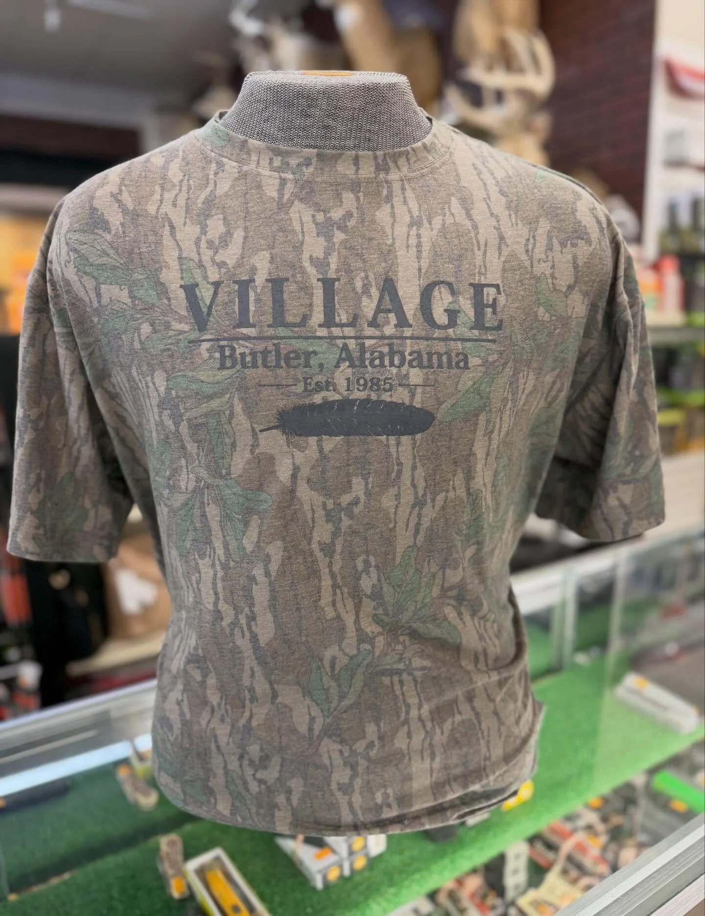 🔥 Village Greenleaf Washed-Out Tees are here!
Classic camo look with our Village &bull; Butler, Alabama &bull; Est. 1985 design.

Perfect for turkey season, the woods, or everyday wear. 🦃