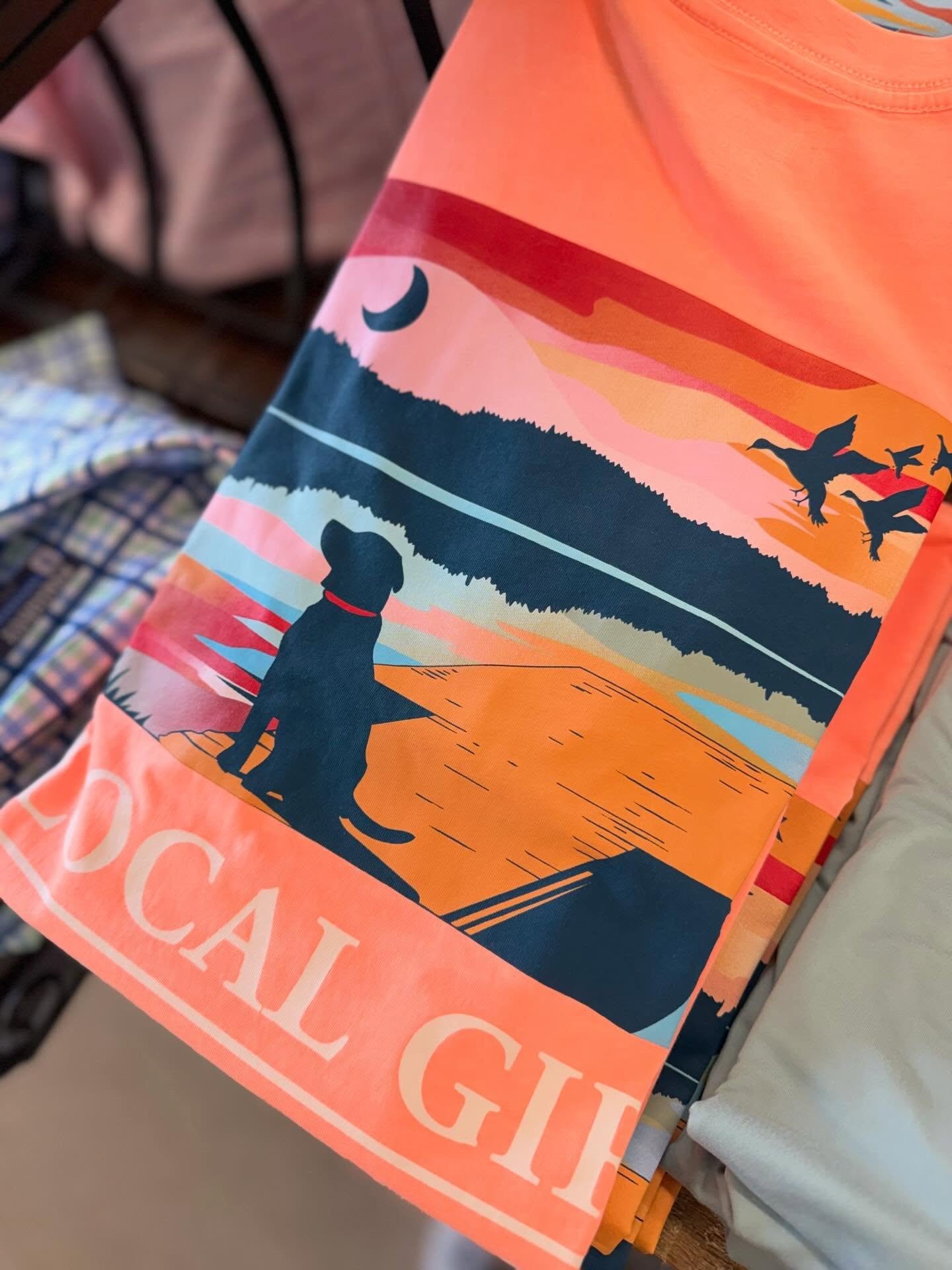 That neon coral glow 😍🧡
Local Girl Outfitters tee is giving all the summer vibes 🌅🐾

Come grab yours in store! ✨😎