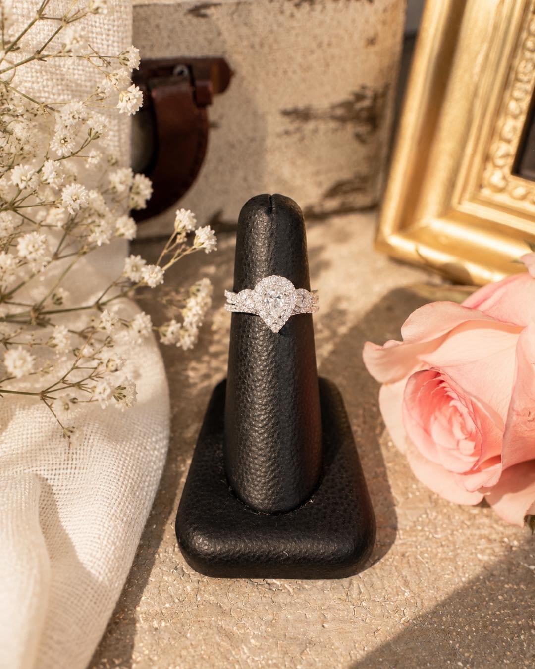 A little sparkle goes a long way! ✨💍

This stunning pear-shaped diamond is surrounded by a shimmering halo and accented diamonds down the band, creating a look that is timeless, elegant, and impossible to forget! 

The perfect ring for your forever!