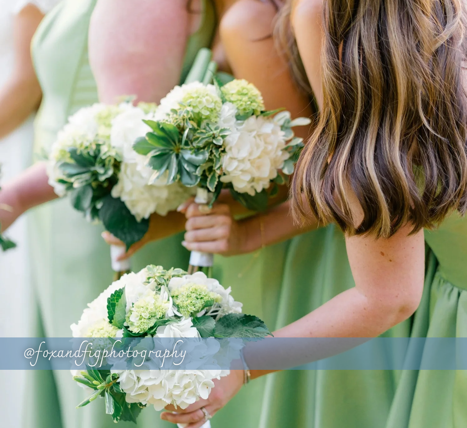 A Photo of bridesmaids holding bouquets