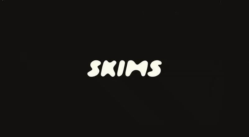 Black background with the word 'SKIMS' in white, stylized text in the center.