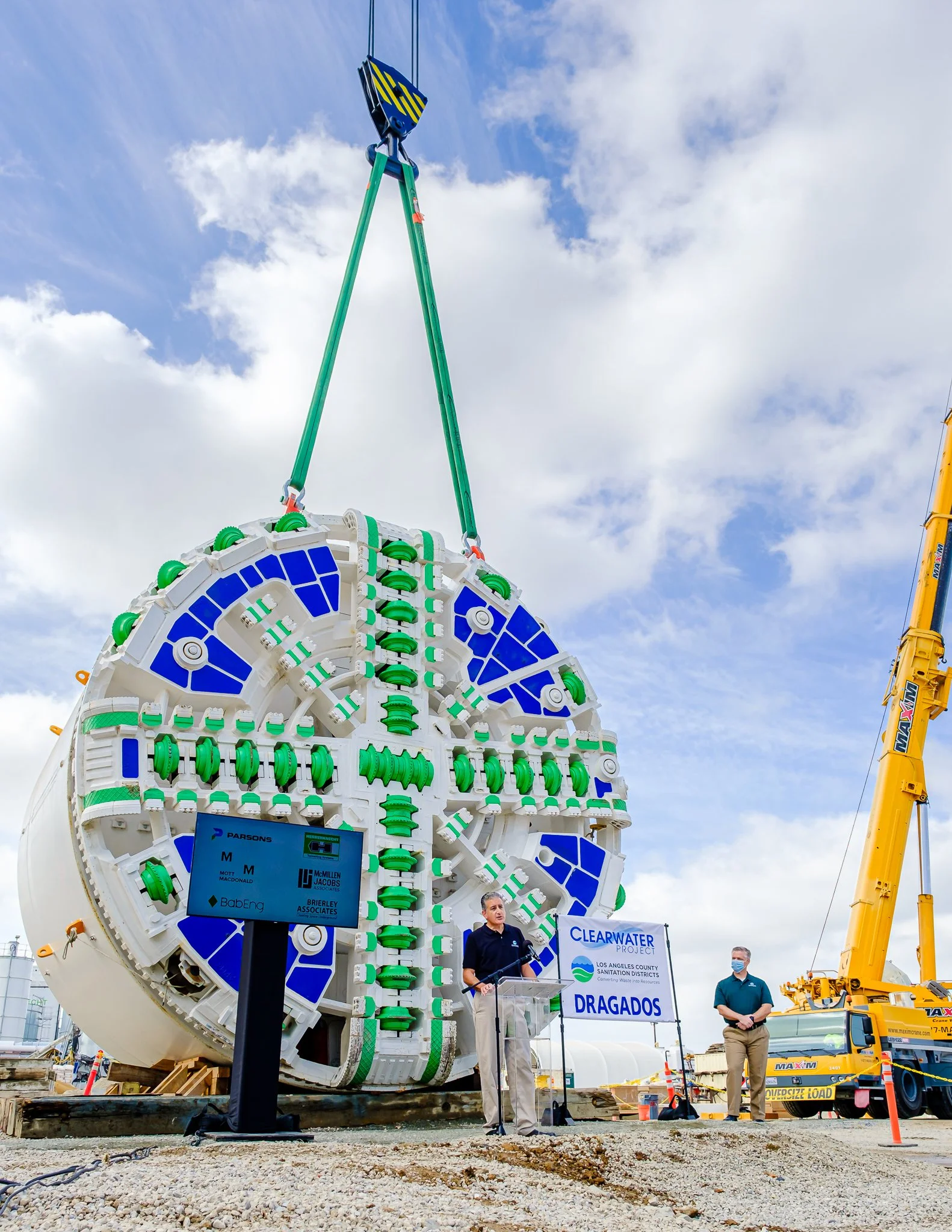 Chief Engineer Robert Ferrante standing in front of the tunnel boring machine at the Clearwater Launch Event.