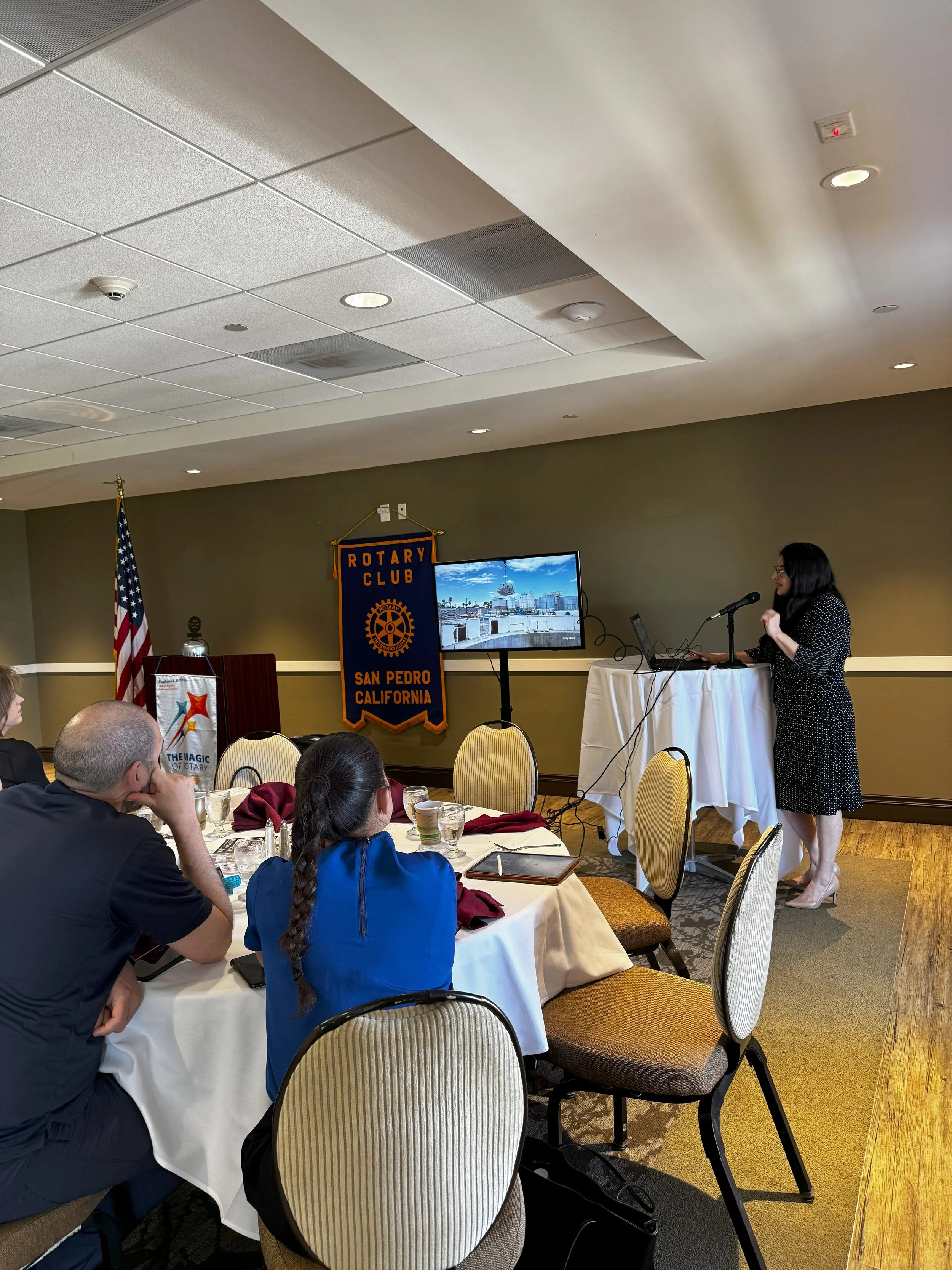 Maria presenting at San Pedro Rotary Club