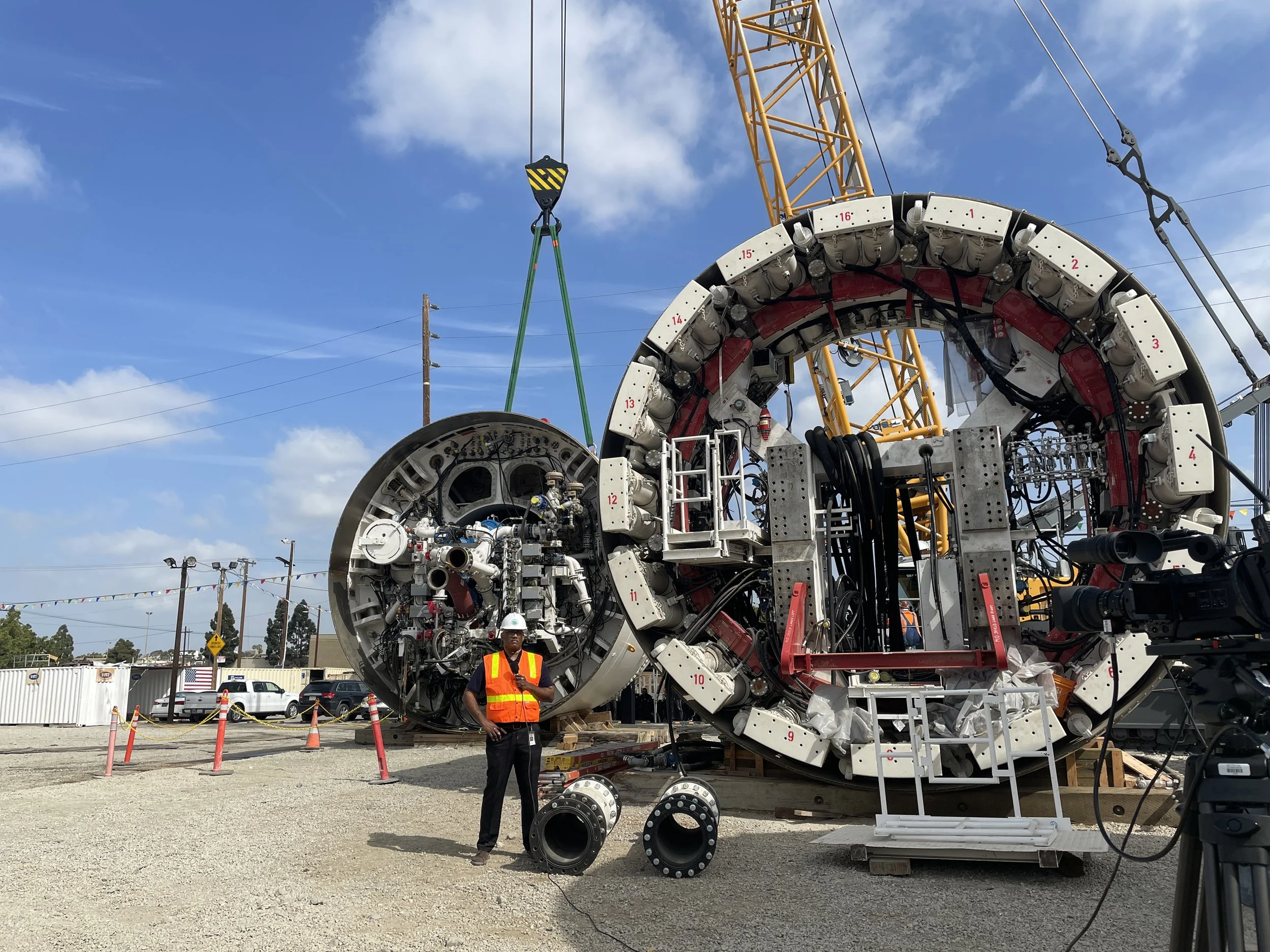 Basil Hewitt standing next to the tunnel boring machine’s front segments.
