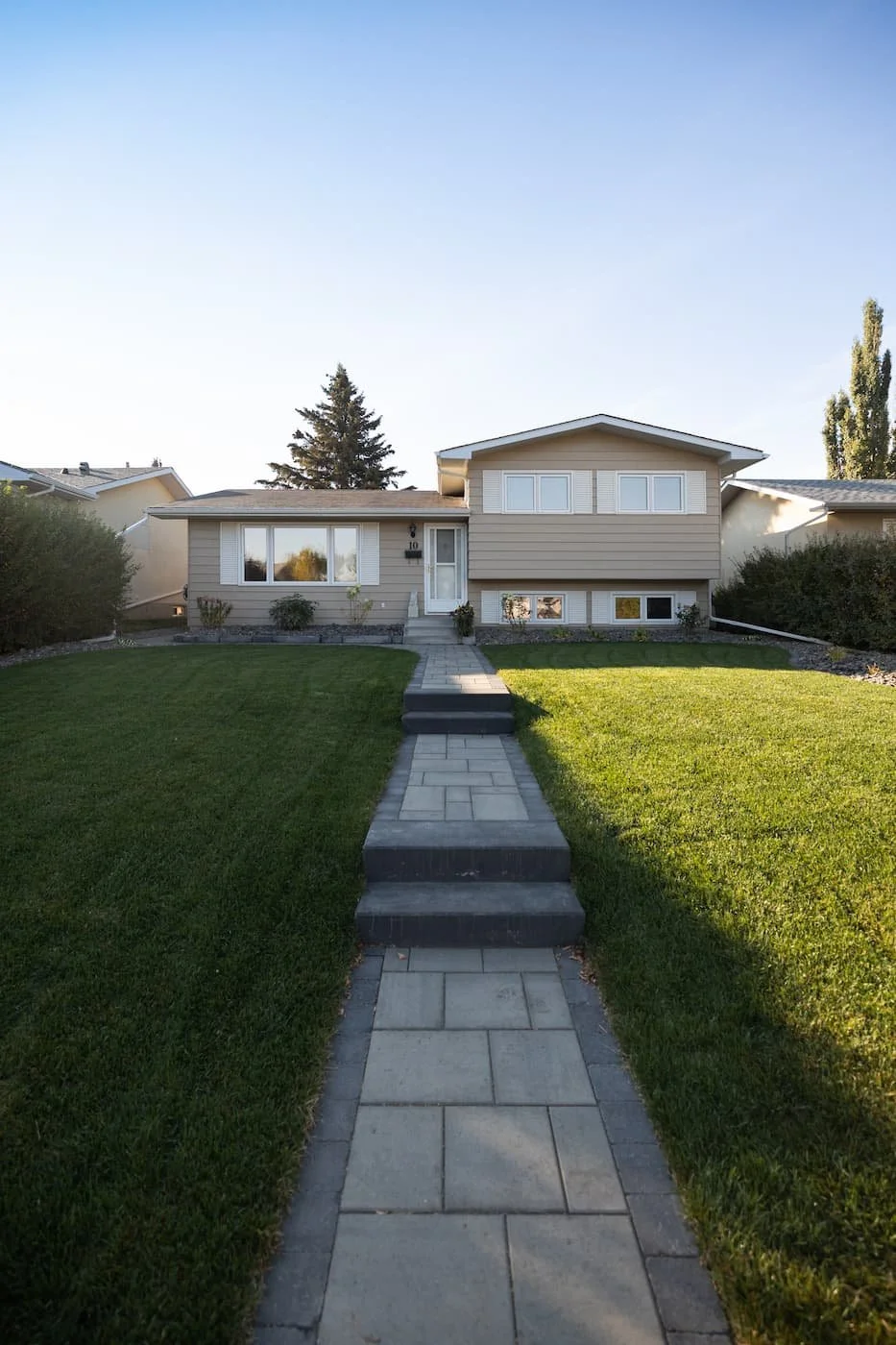 Walkway with steps leading to the front of the house