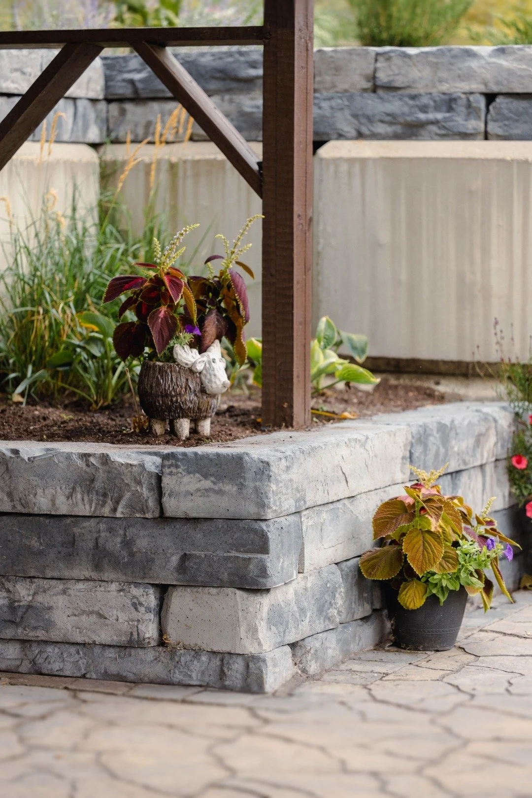Let Us Help You Create the Perfect Garden Wall

At Blue Isle Landscaping, we specialize in designing and installing natural stone and precast block garden walls that bring both functionality and beauty to your outdoor space. Whether you're looking to