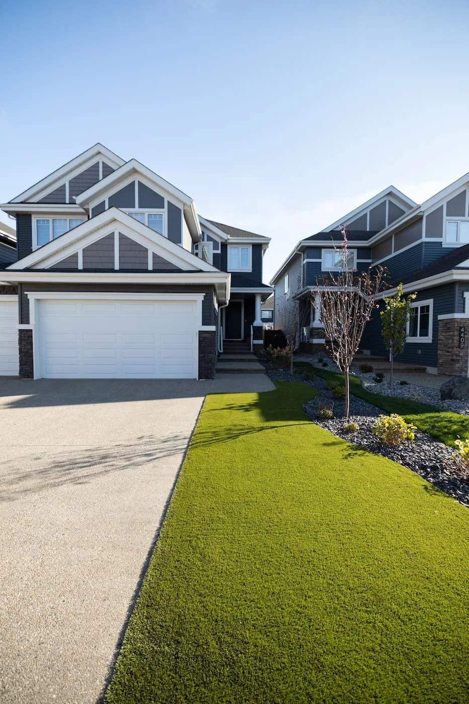 Front yard artificial turf and landscaping