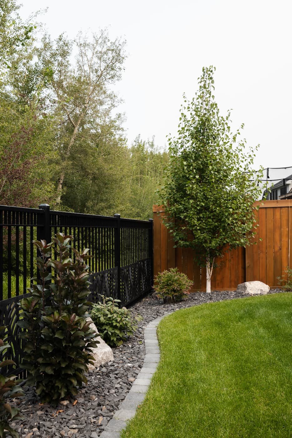 Edging and landscape rock backing on to a ravine