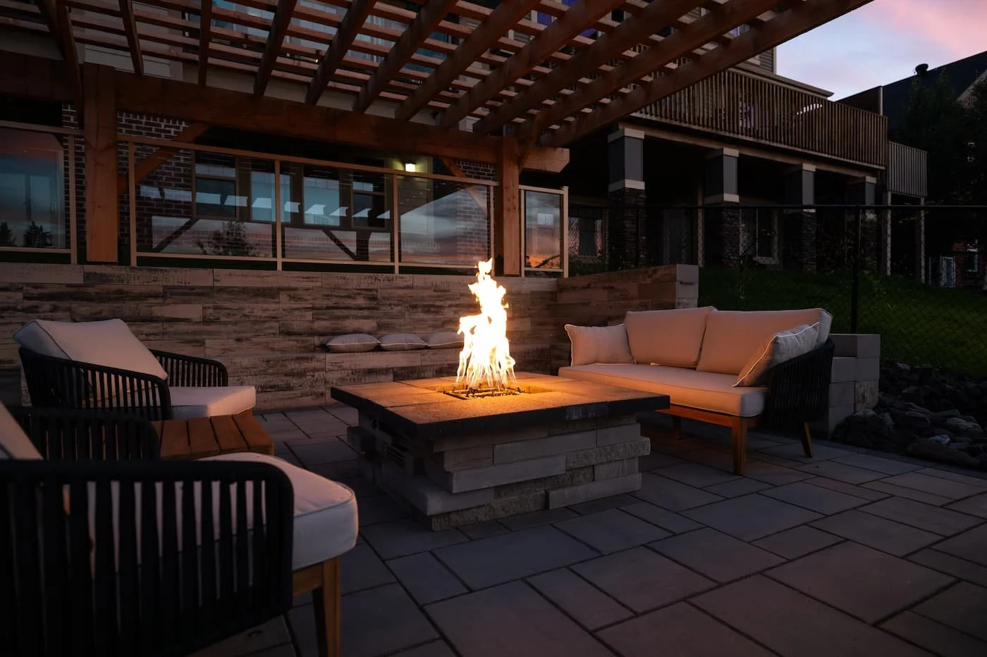 Gas burning fire feature on a warm summer night