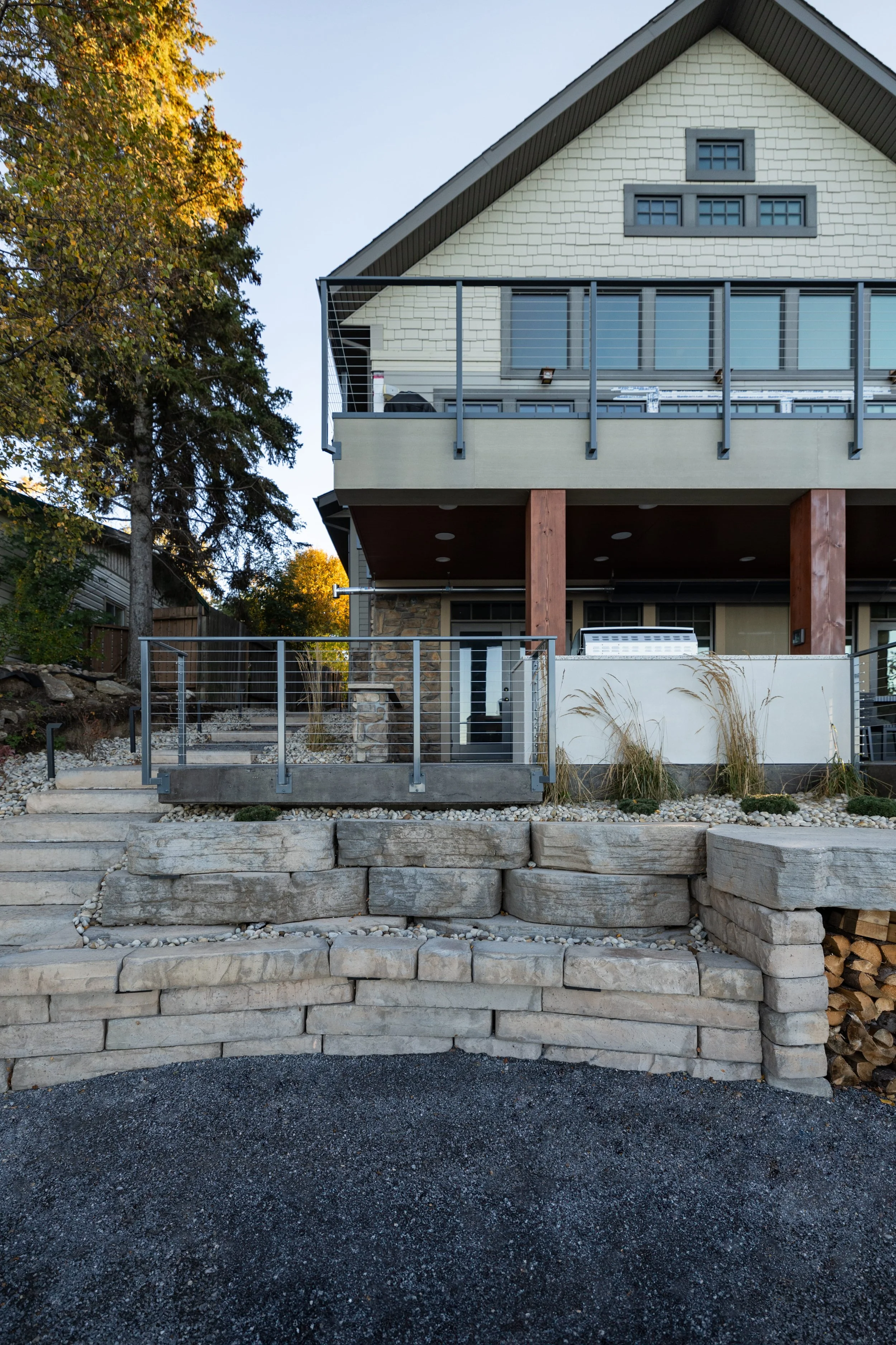Final grading on lake lot with retaining wall