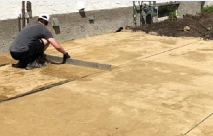 Patio base being screeded to prep for paving stones