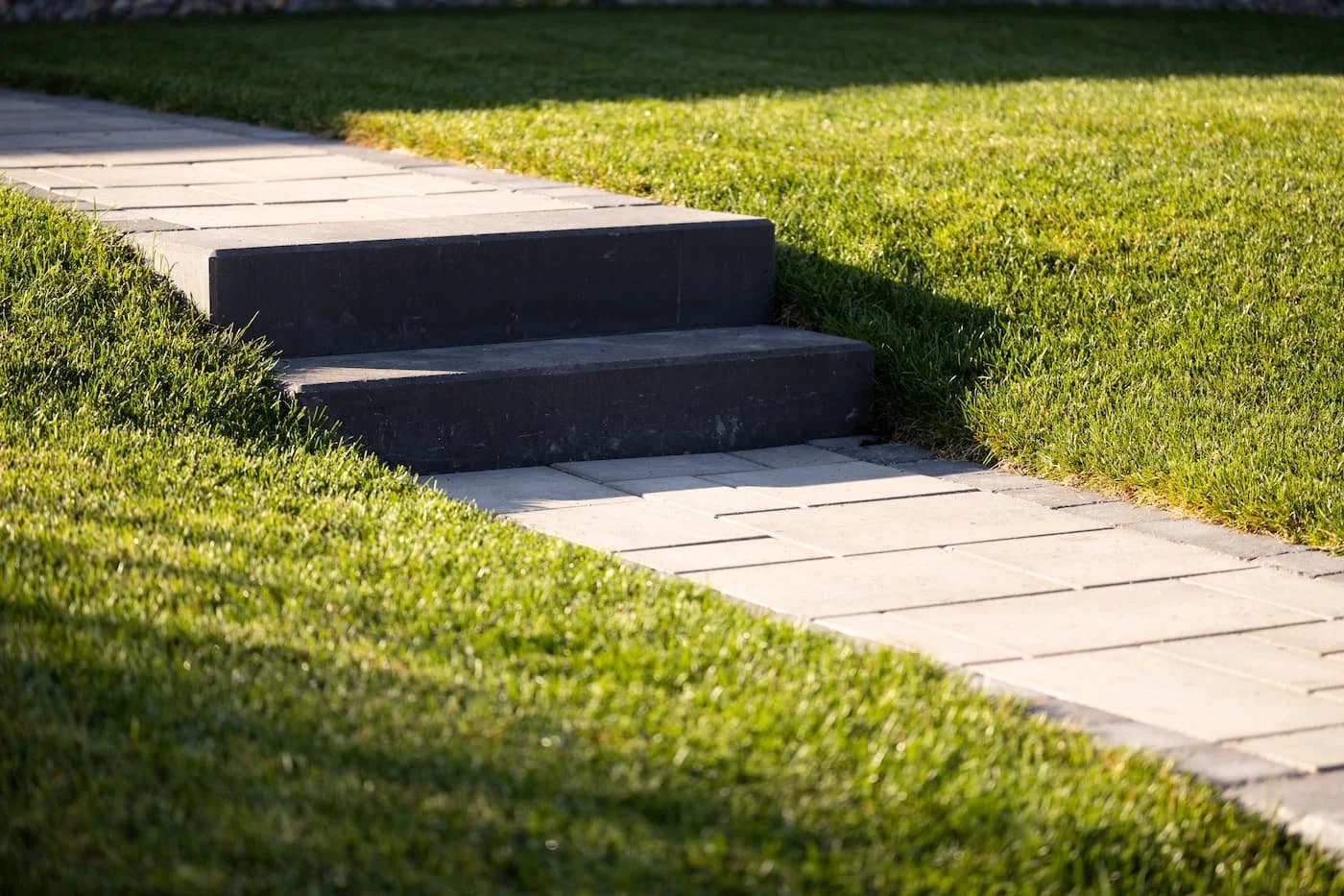 Steps to support grade of a front yard walkway