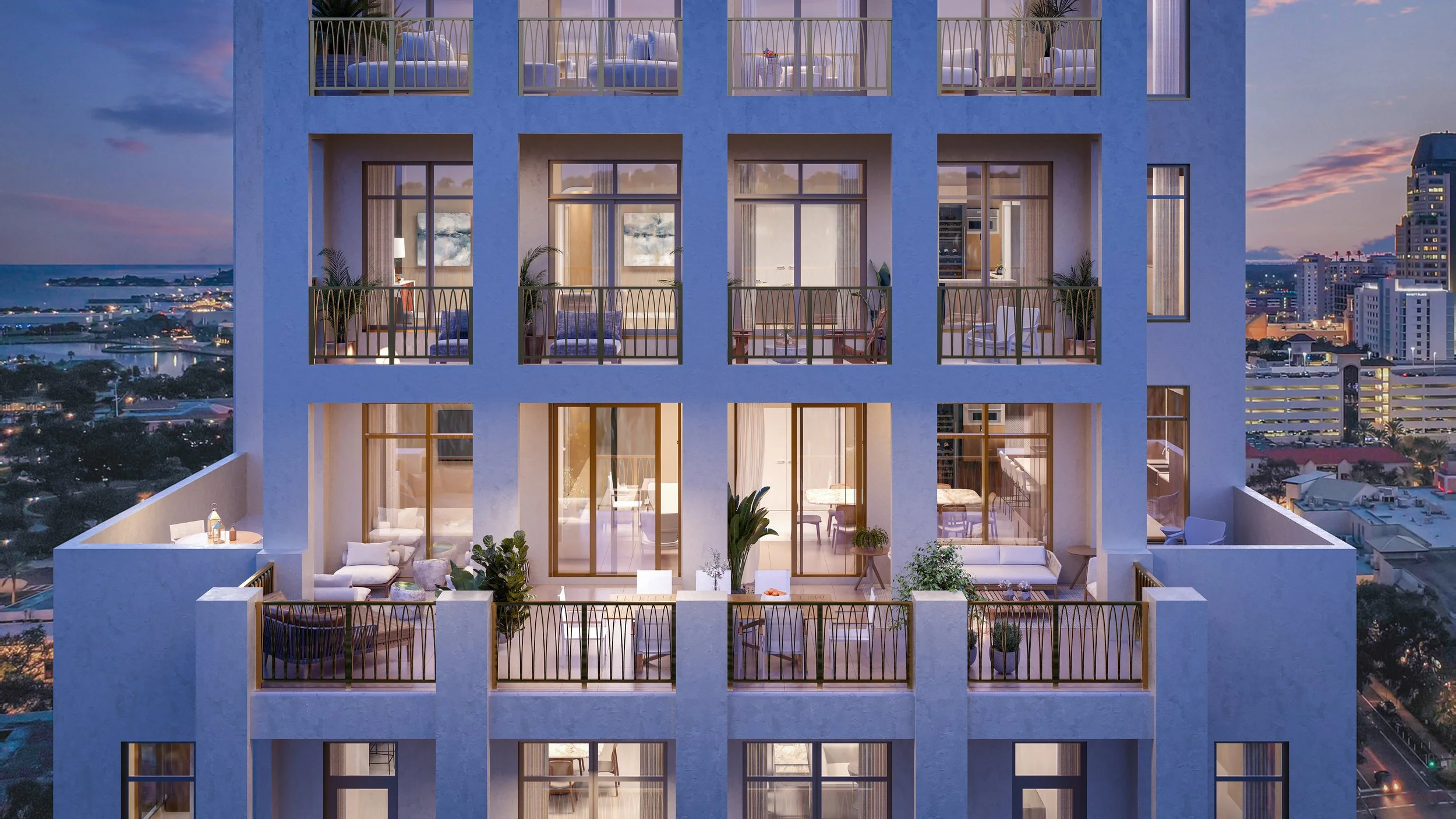 3D rendering of a night view of a modern apartment building with illuminated balconies and interior rooms, overlooking a cityscape with lights and water in the distance.