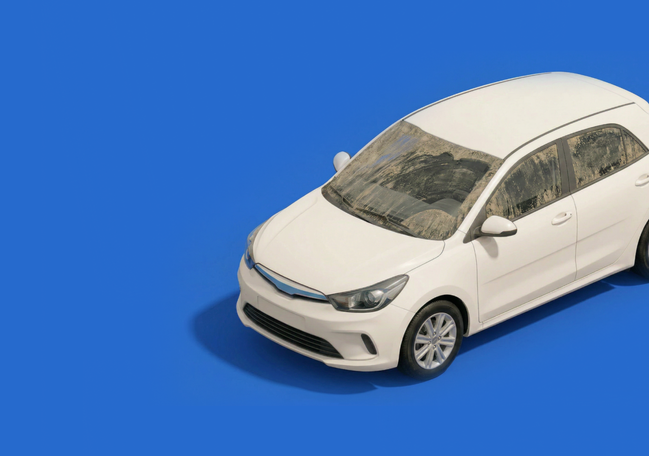 A white sedan car with dusty windows parked on a solid blue background.