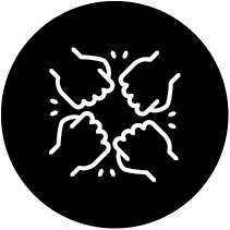 Four fists bumping together in a circle, symbolizing unity and teamwork.