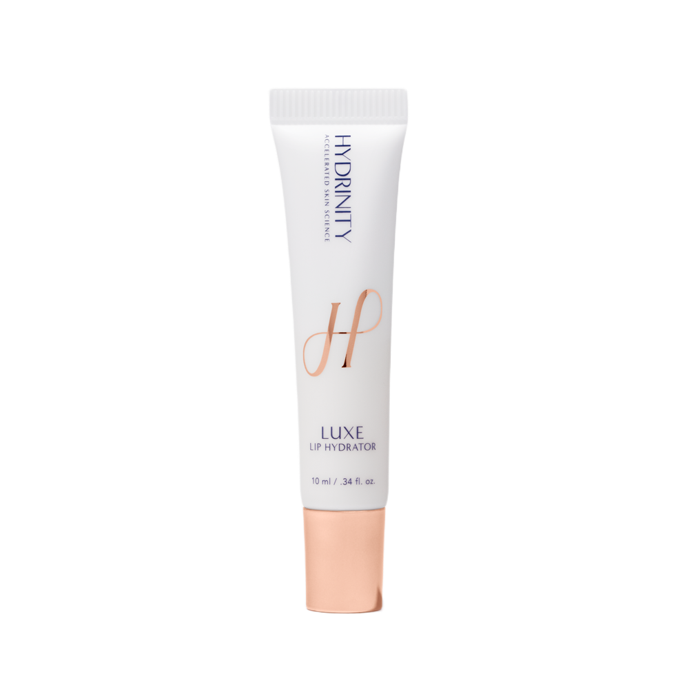 A tube of Luxe Lip Hydrator skincare product with a white body, gold-colored cap, and labels indicating it hydrates lips, with a capacity of 10 ml.