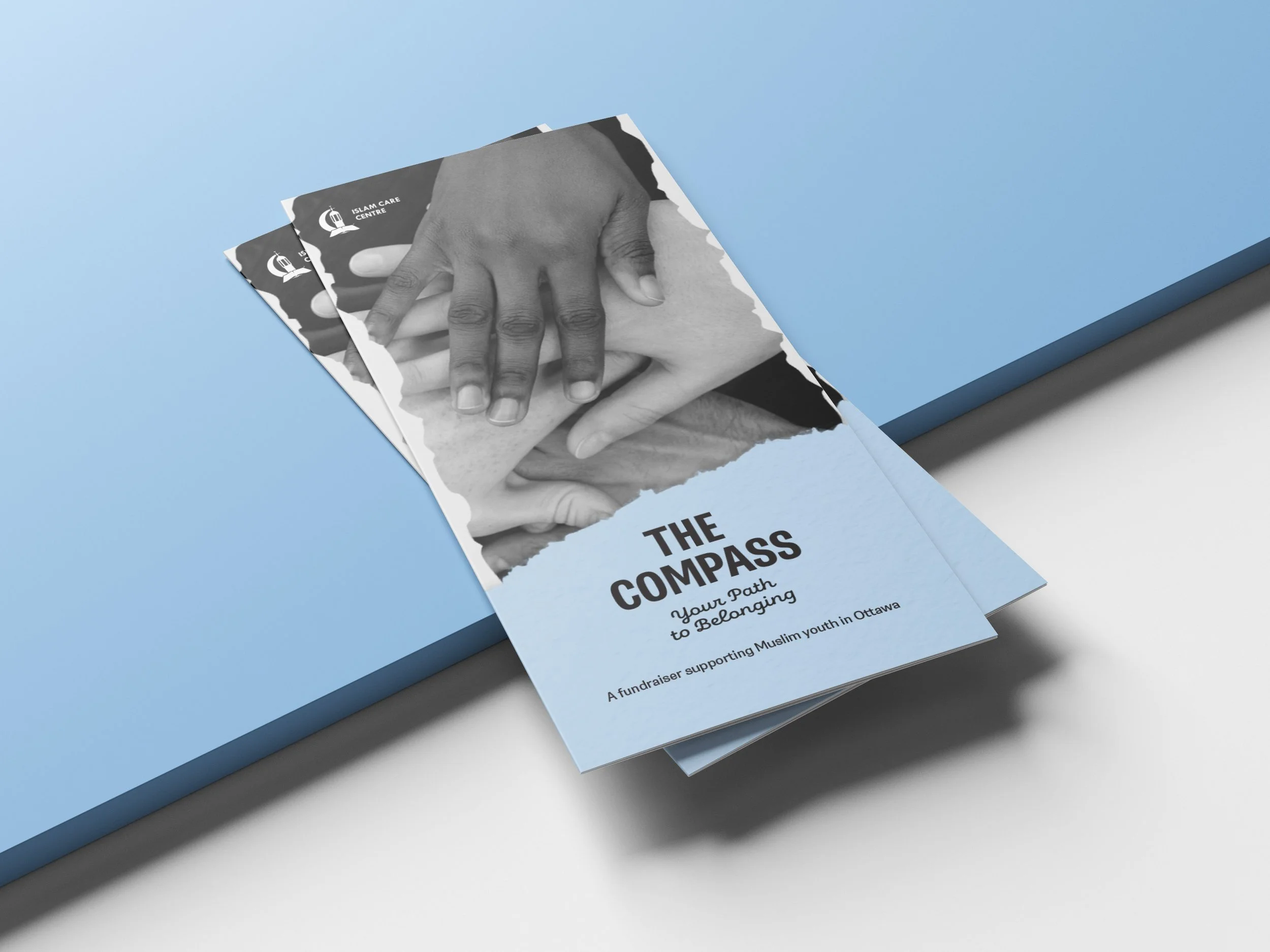 Brochure titled 'The Compass: Your Path to Belonging,' supporting Muslim youth in Ottawa, featuring an image of diverse hands stacked together.