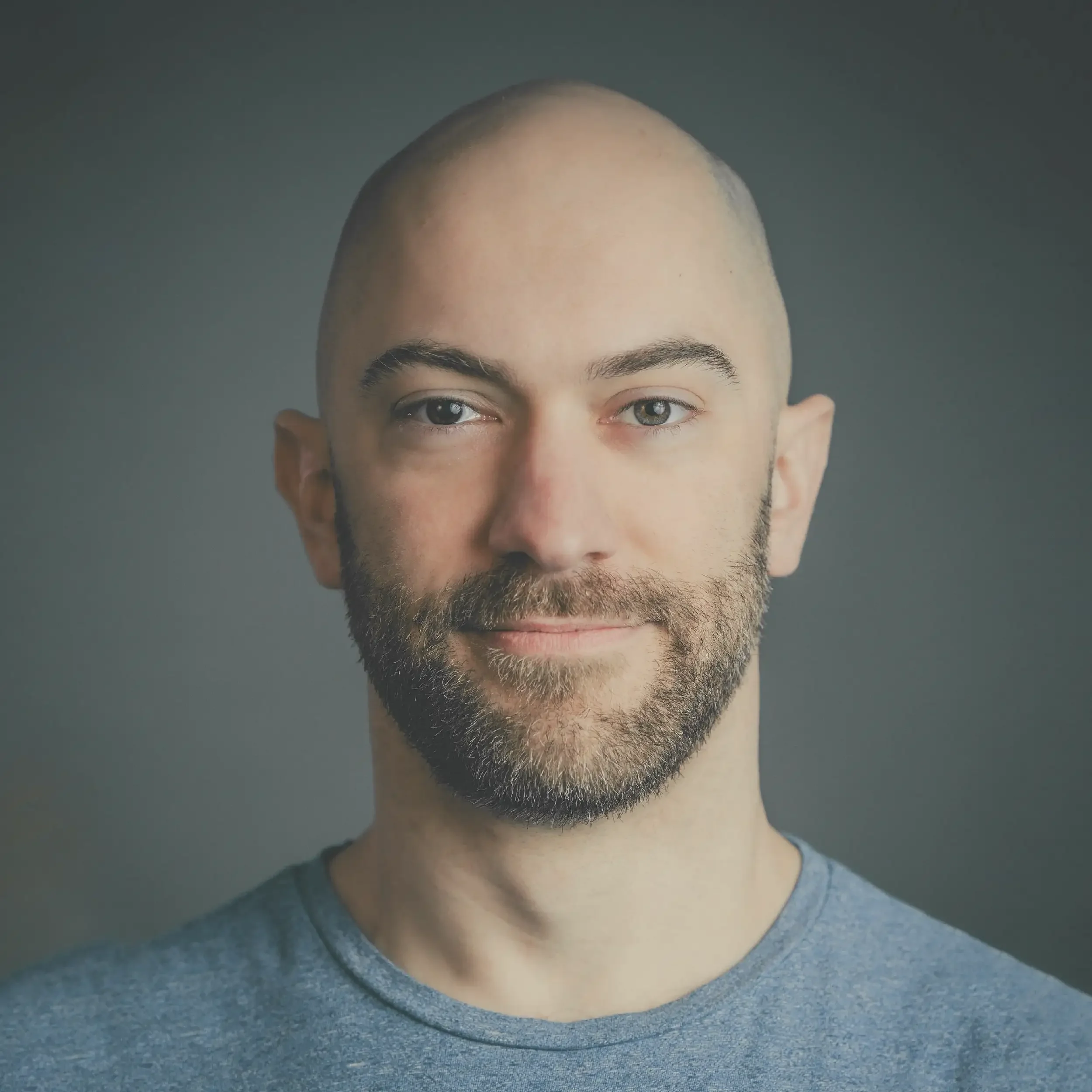 A headshot of Dan Greco