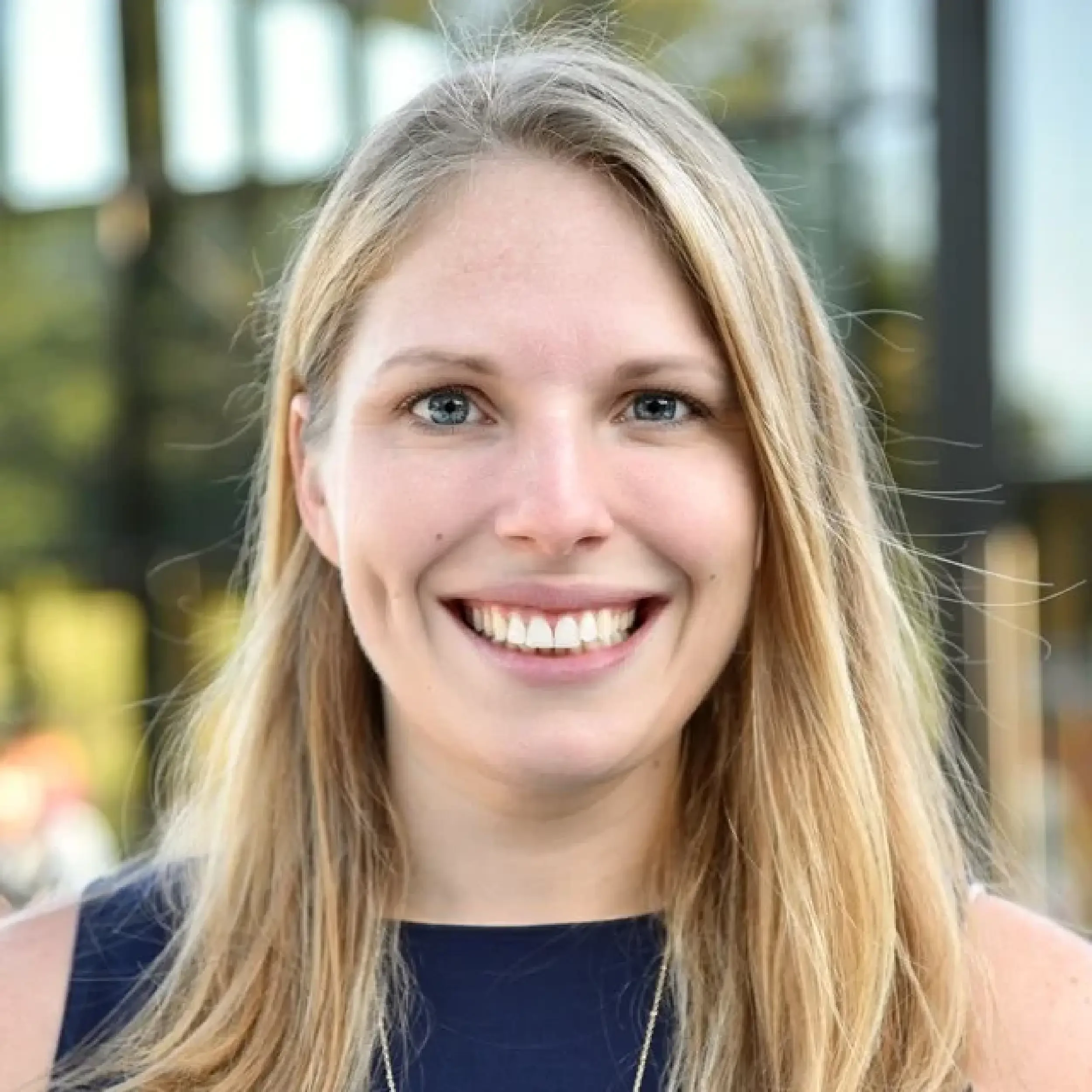 A headshot of Apryle Schneeberger, founder of The Collaborative Center for Social Innovation