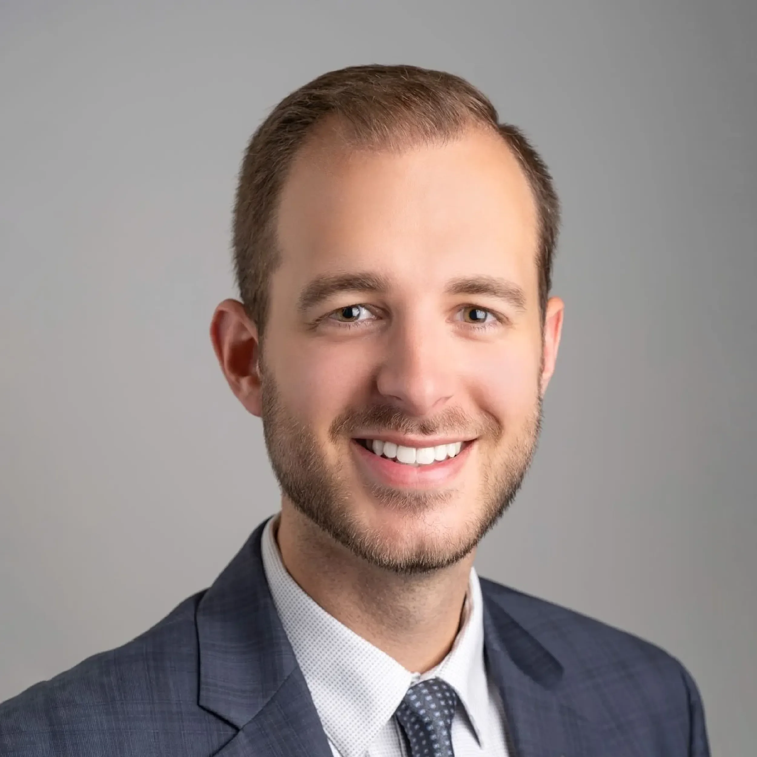 A headshot of Charlie Baxter