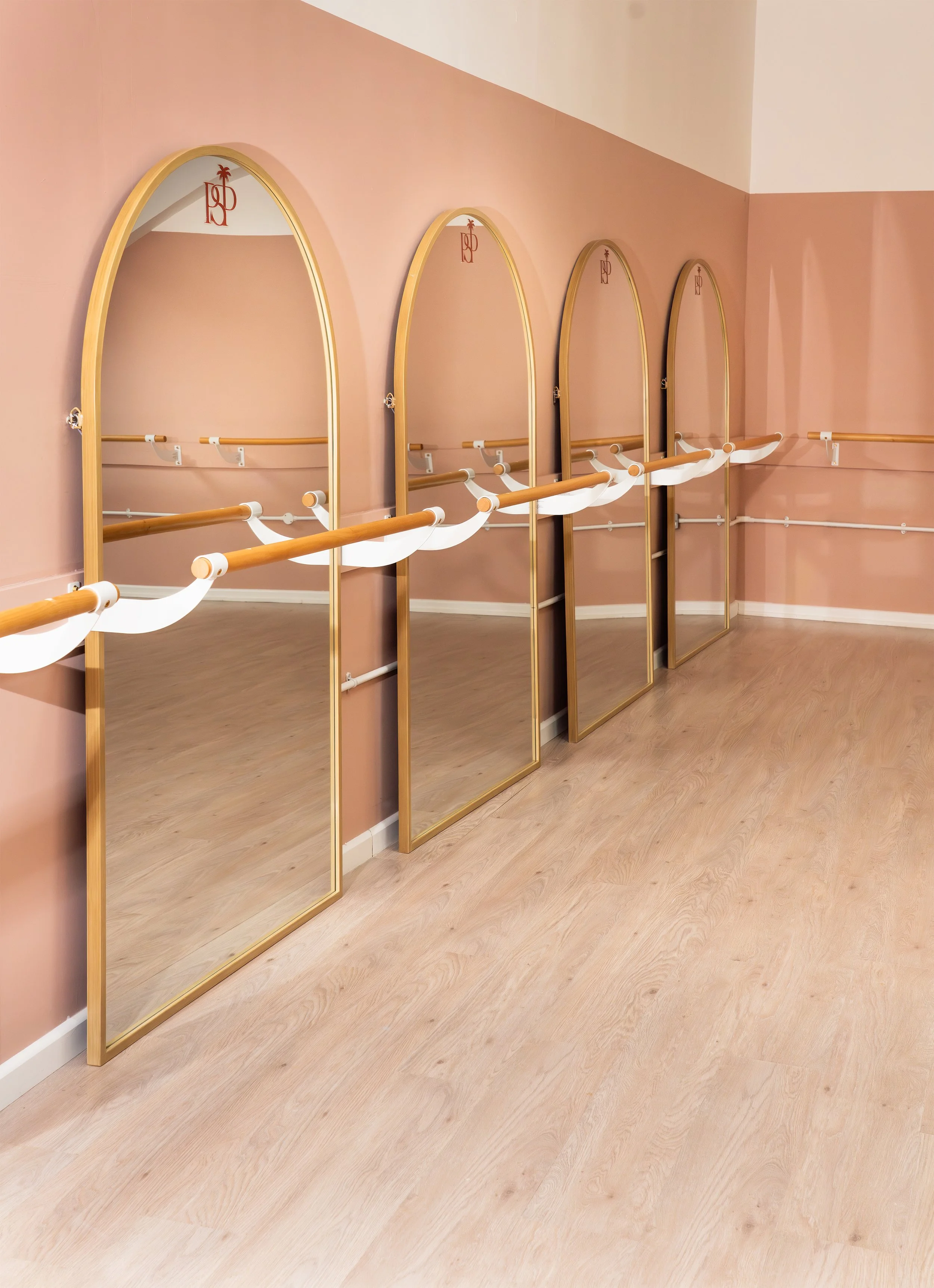 Barre studio with ballet barres at Palm St Pilates, Frome
