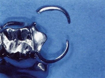 Close-up of a metallic handcuff on a blue background.